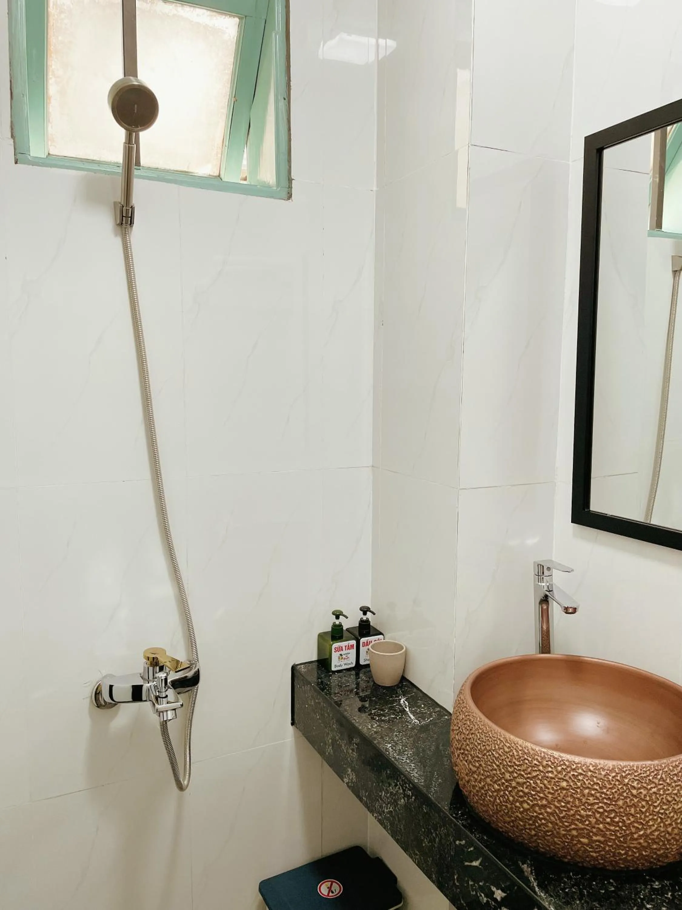 Shower in Under the Sun Homestay