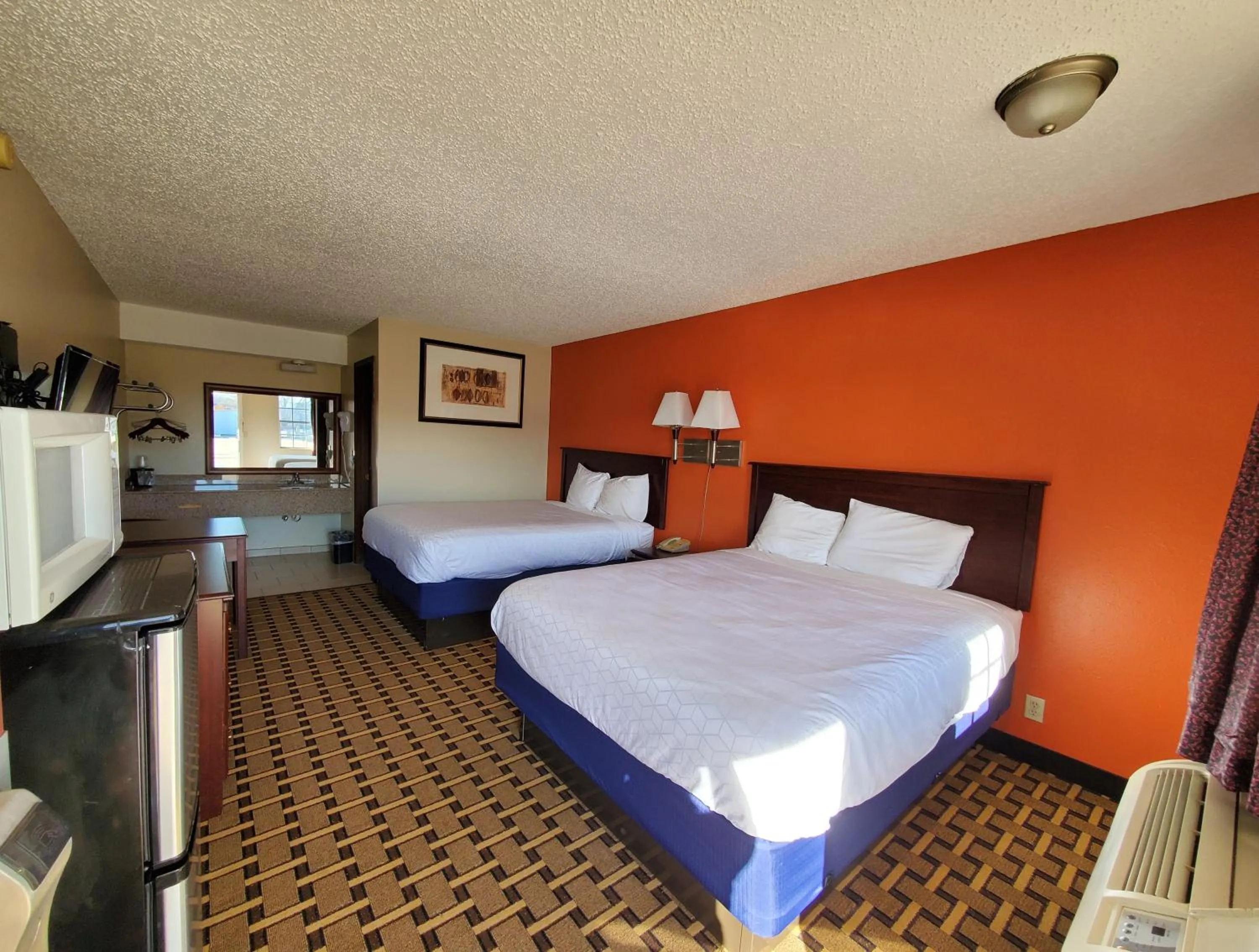 Bed in Relax Inn Henryetta