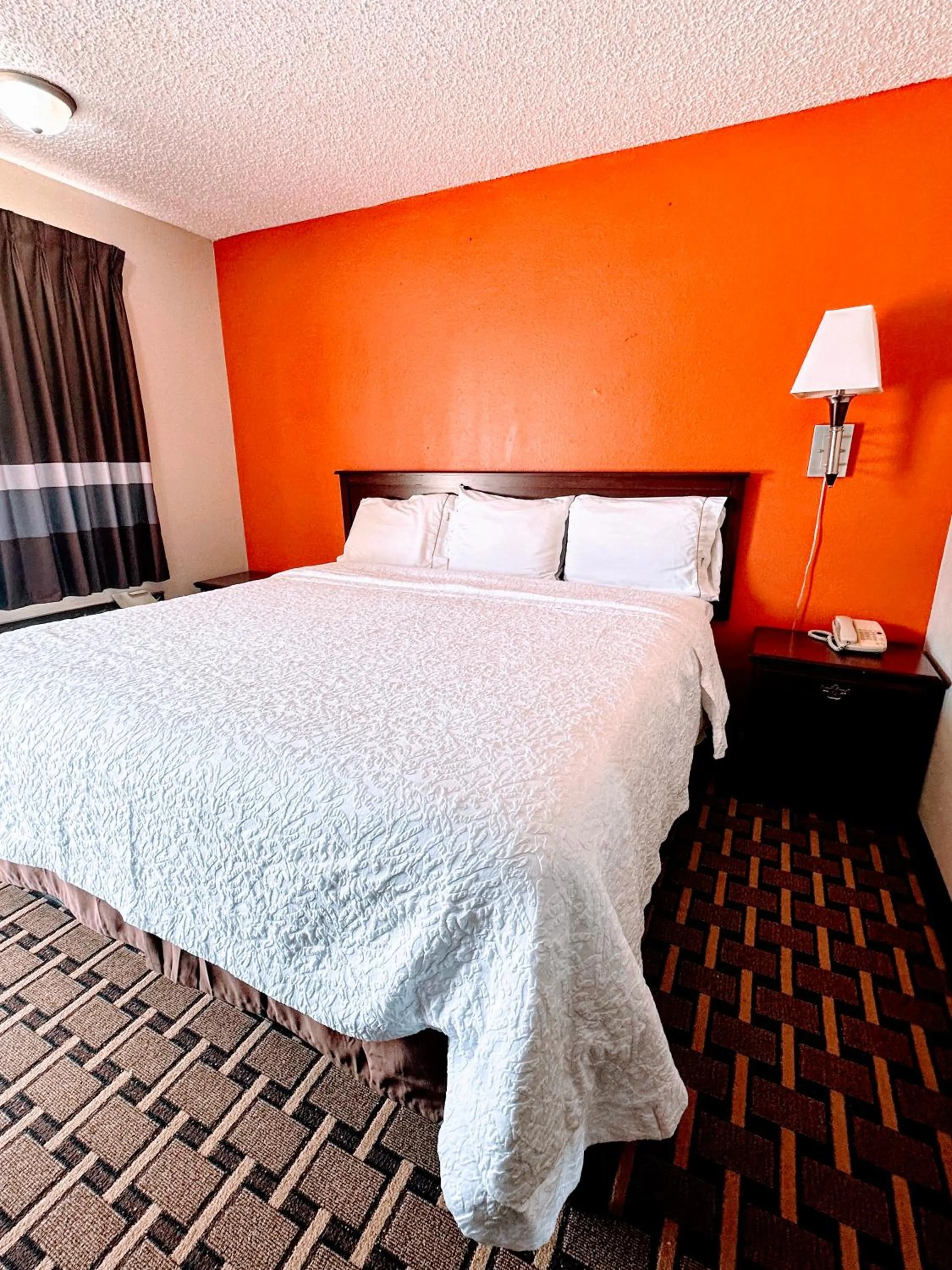 Bed in Relax Inn Henryetta