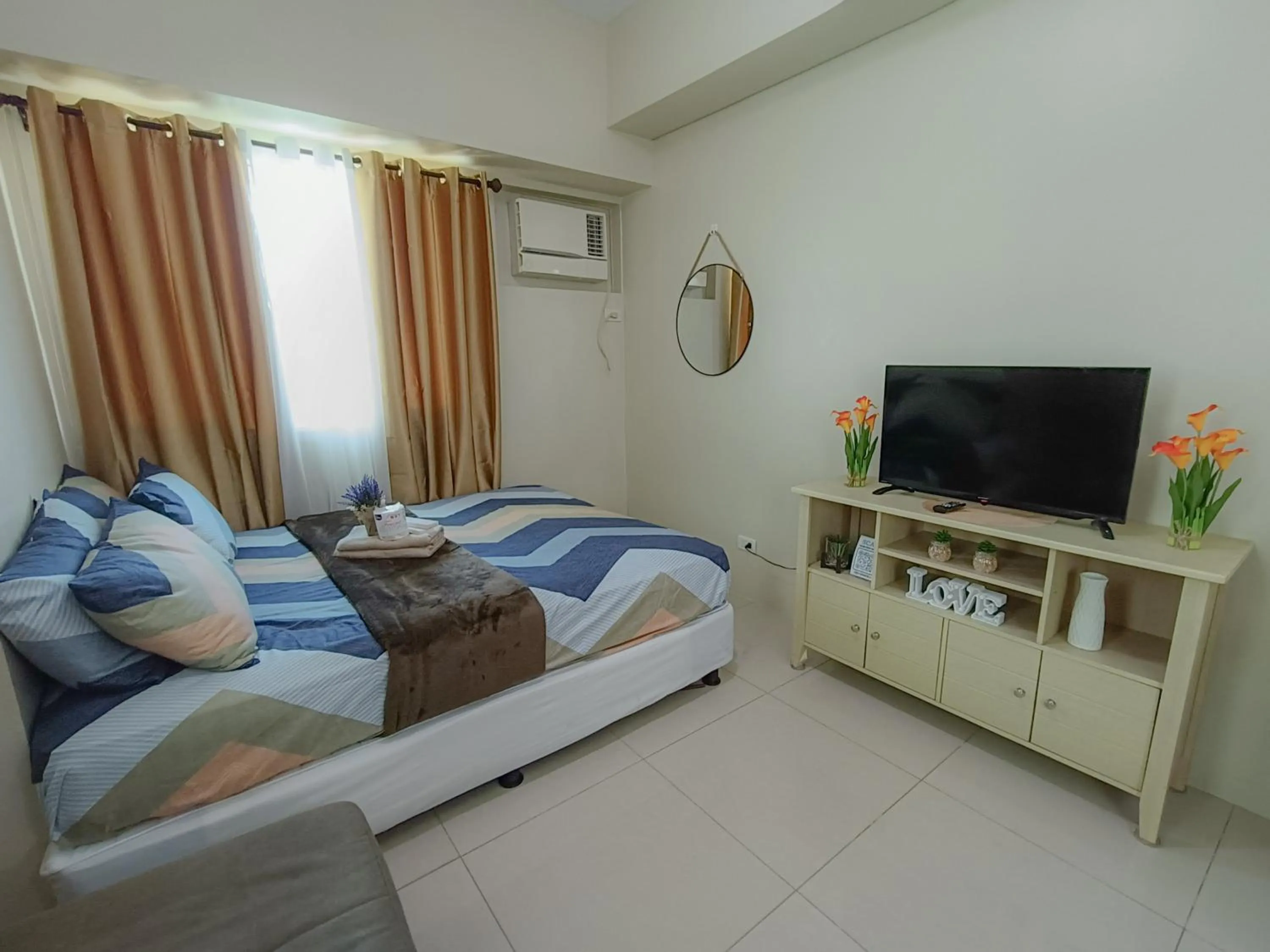 Bed in The Beacon Makati by Cozi Condotels