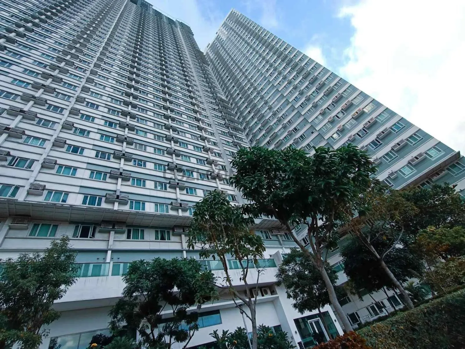Property building in The Beacon Makati by Cozi Condotels