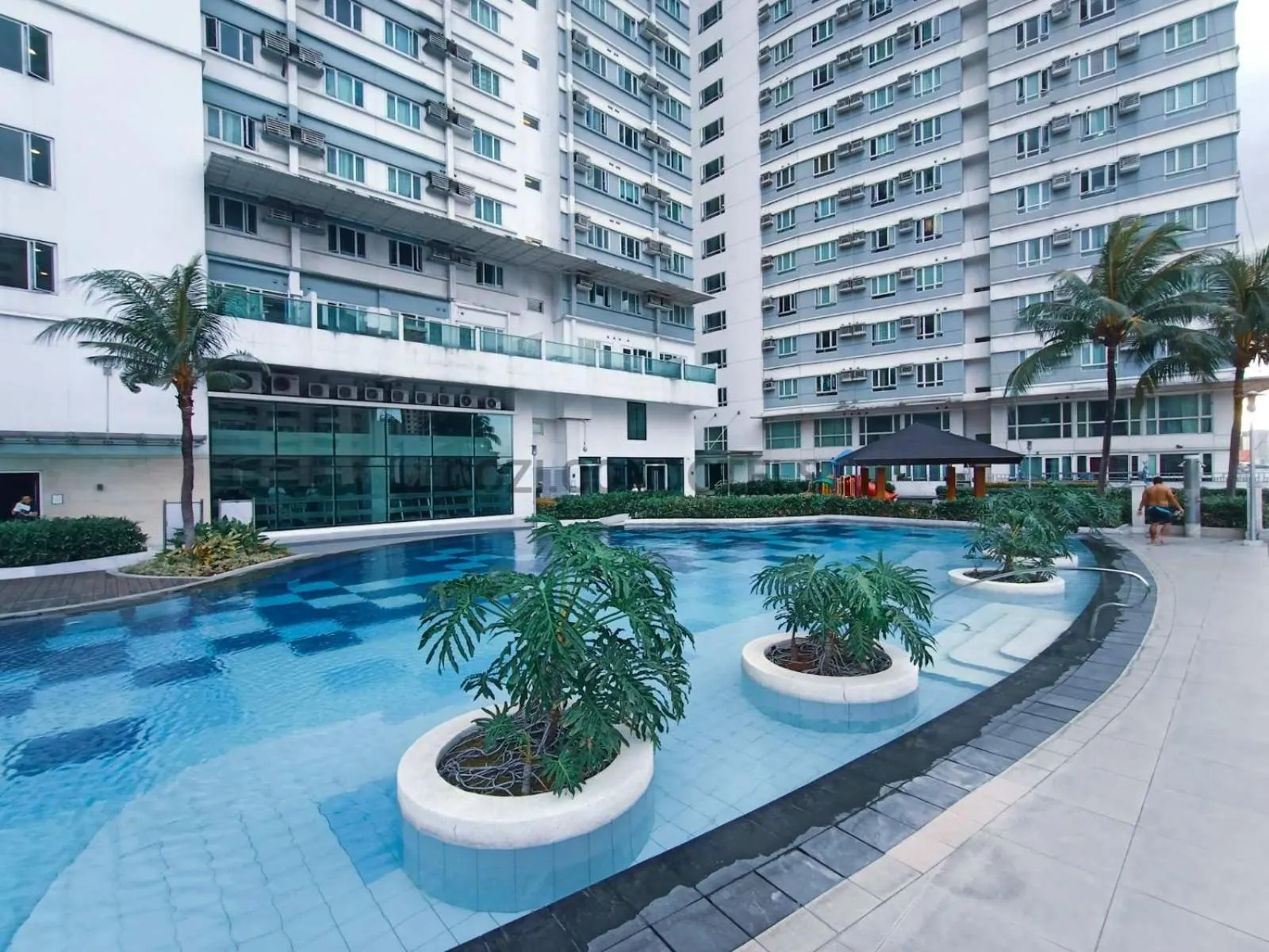 Swimming pool in The Beacon Makati by Cozi Condotels