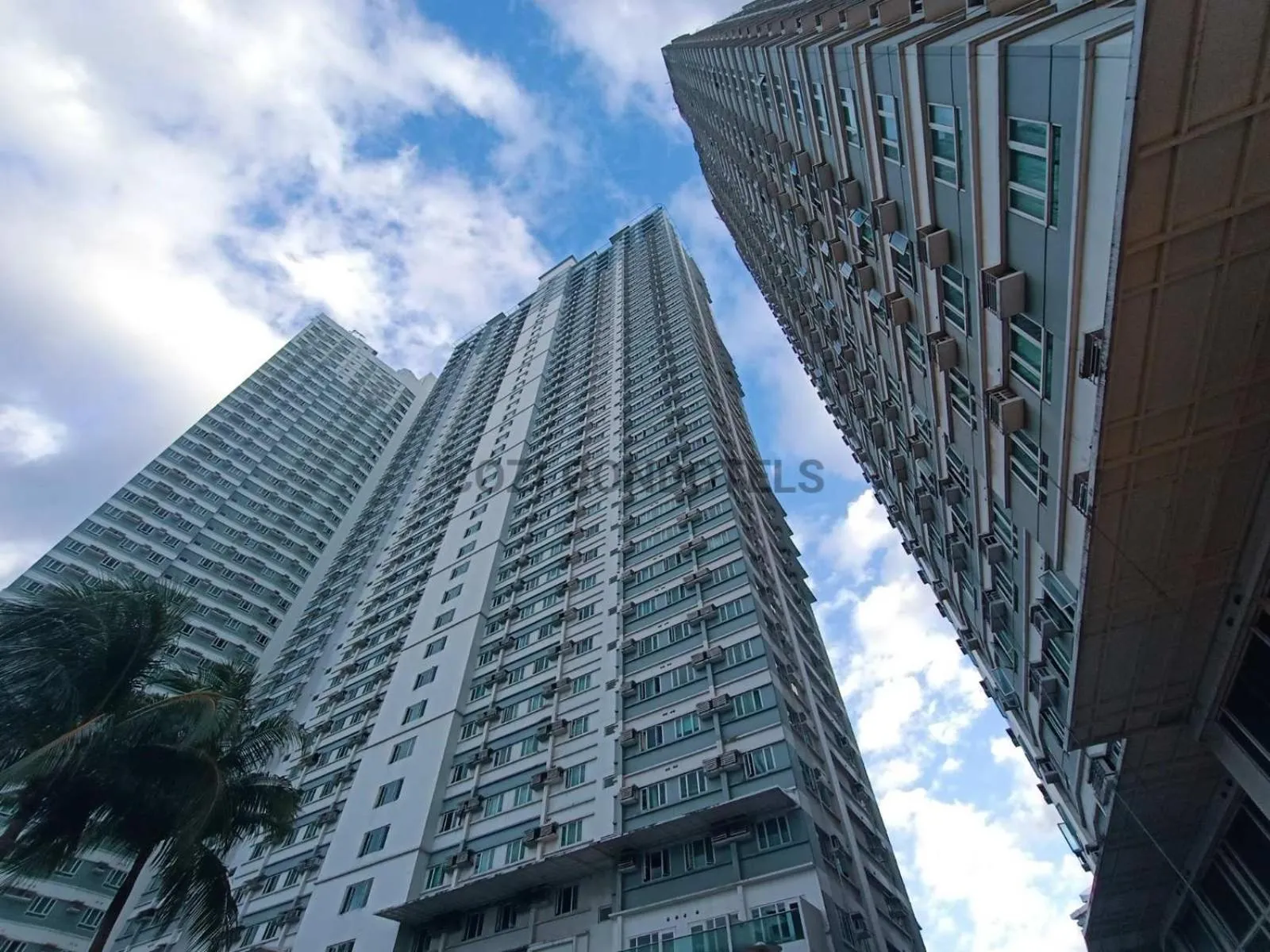Property building in The Beacon Makati by Cozi Condotels