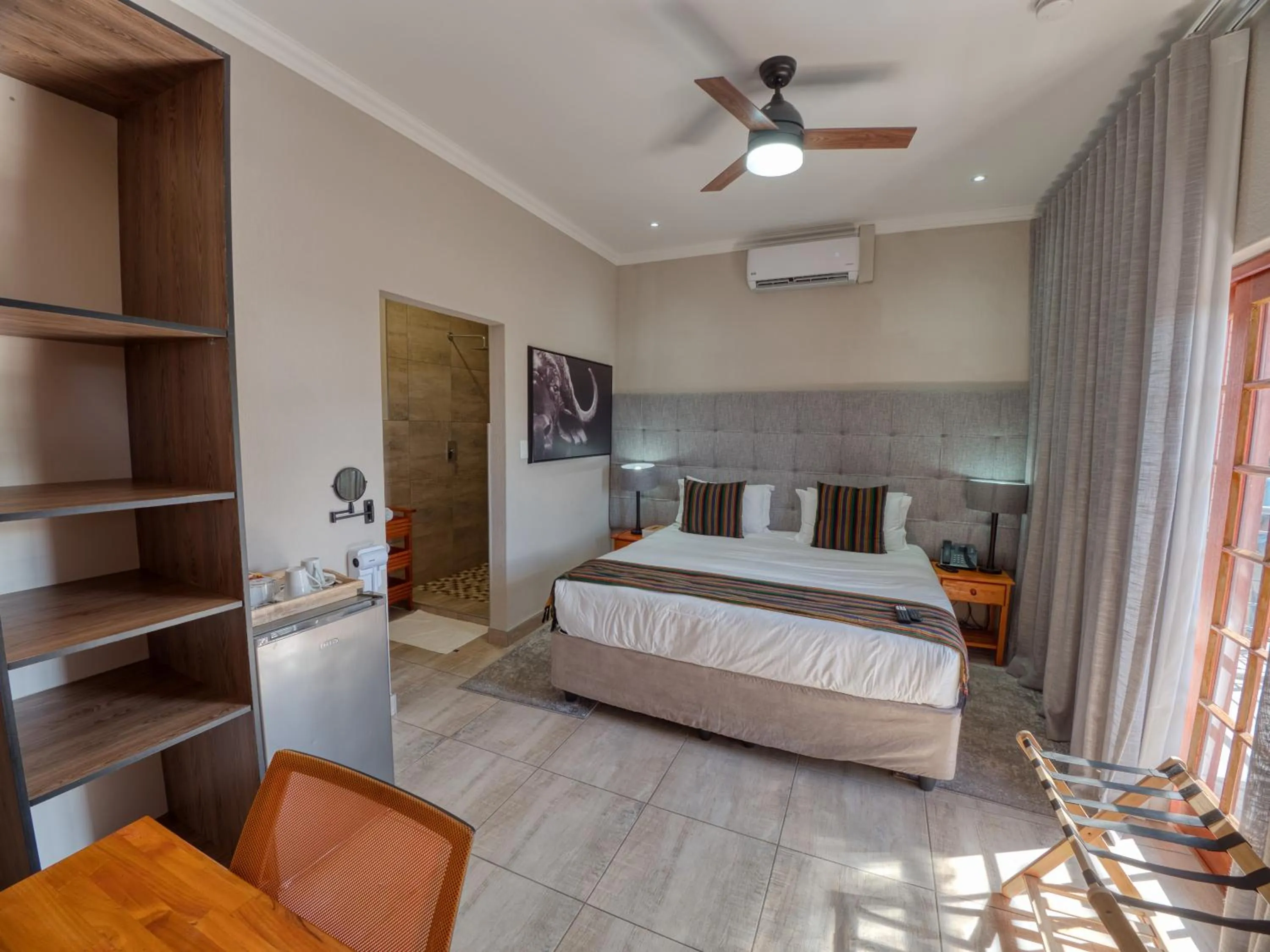 Bed in Tembo Guest Lodge