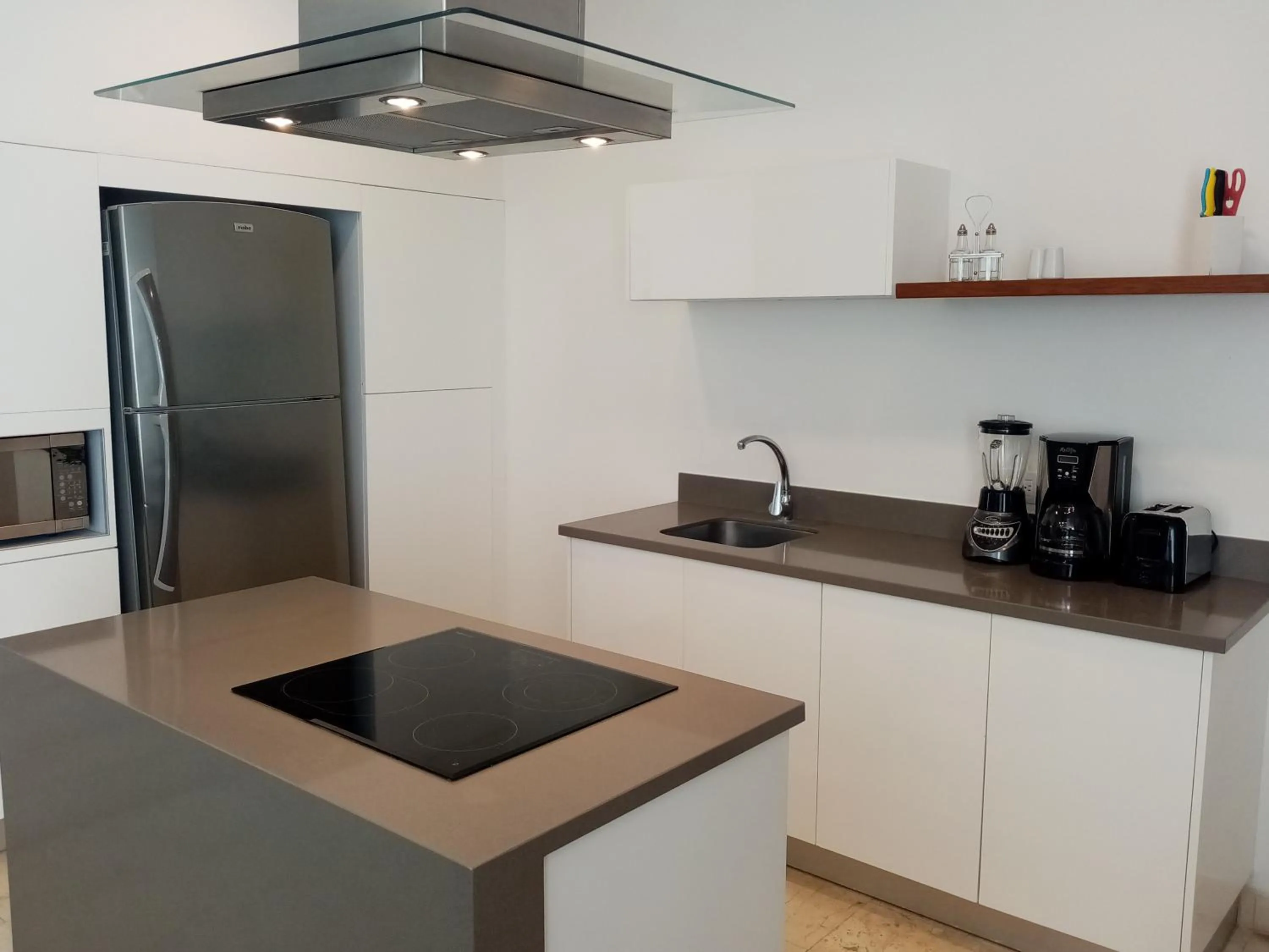 Kitchen or kitchenette in Anah Suites