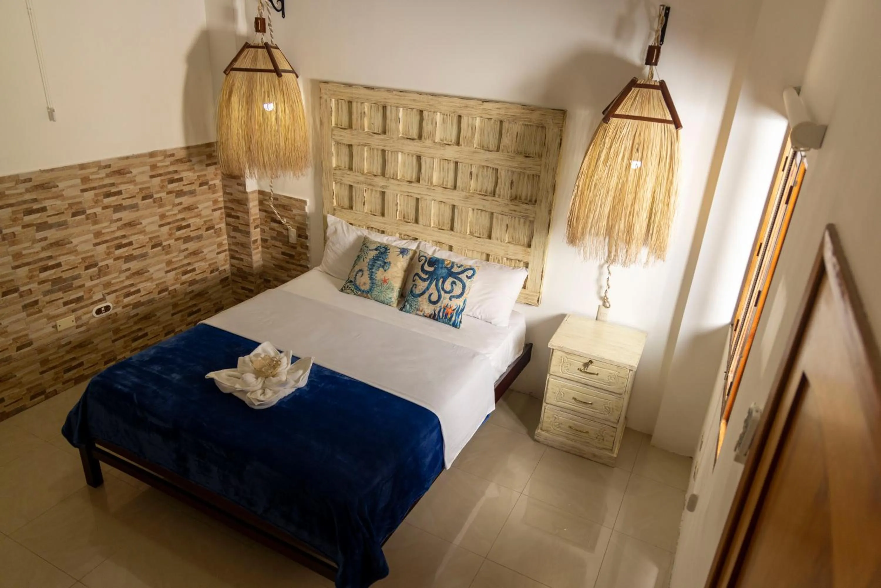 Photo of the whole room, Bed in Hotel Galapagos Planet