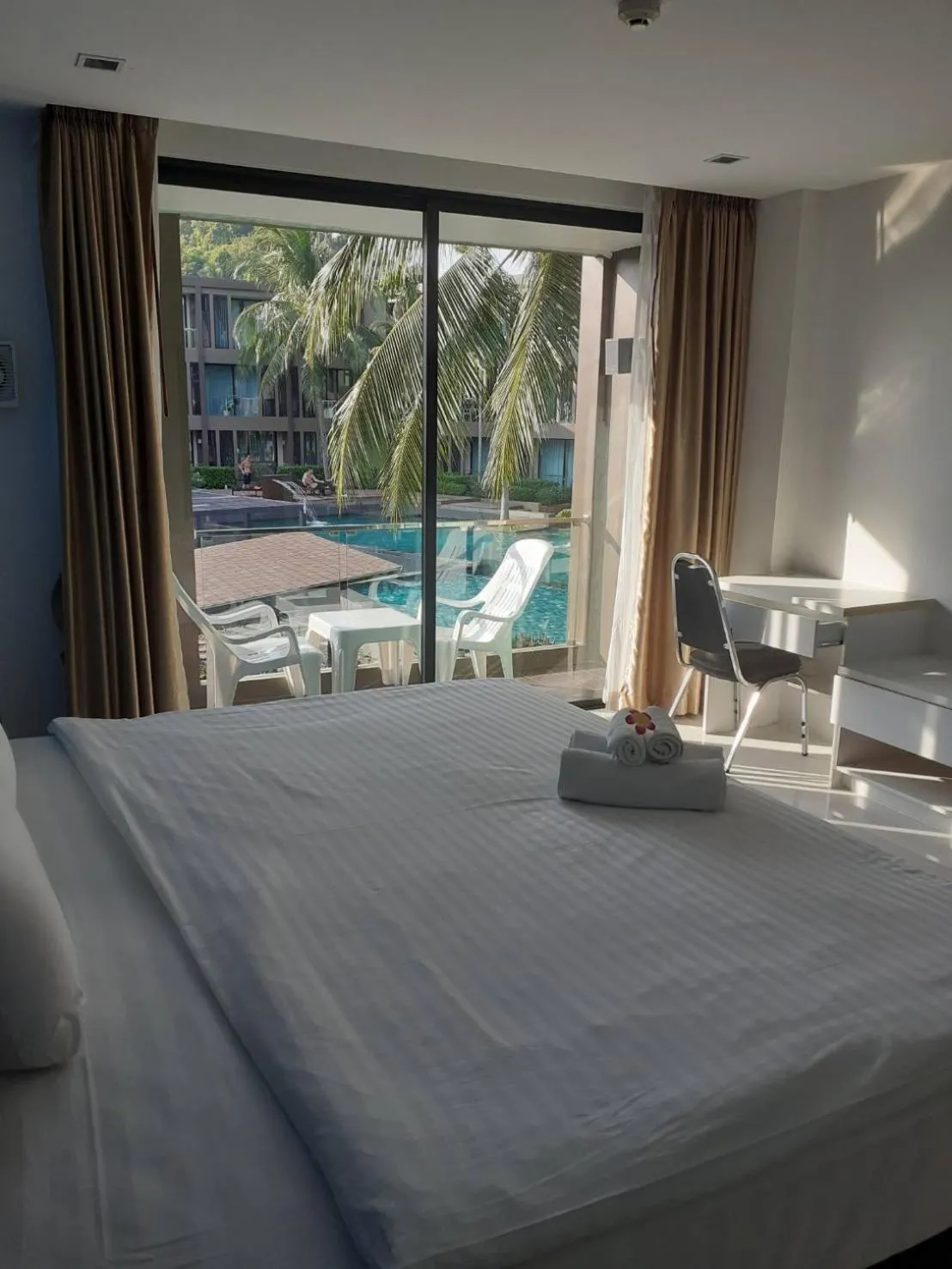 Pool view, Bed in Panwa Beach Side Beachfront