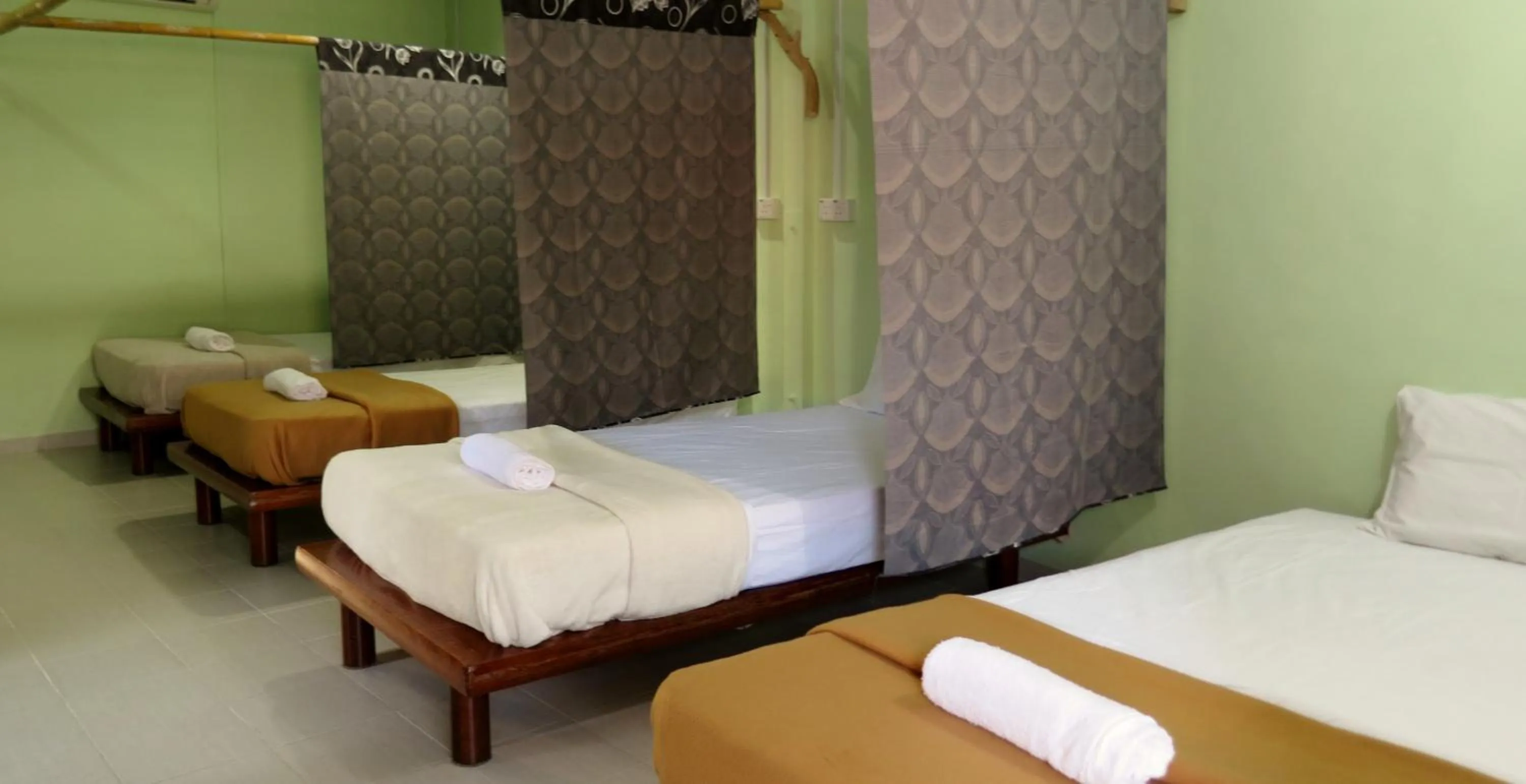 Bed in Pangkor Guesthouse SPK