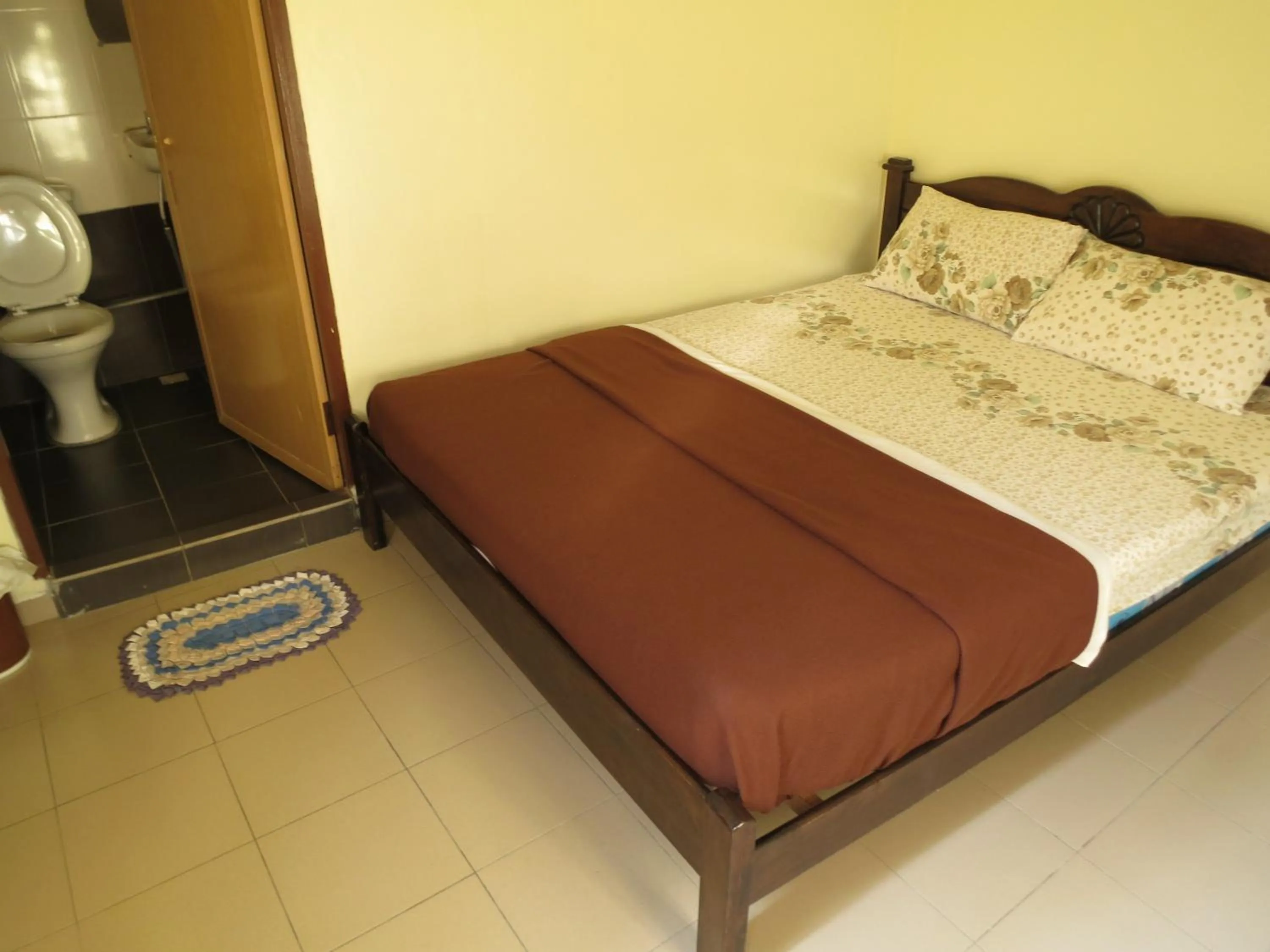 Bed in Pangkor Guesthouse SPK