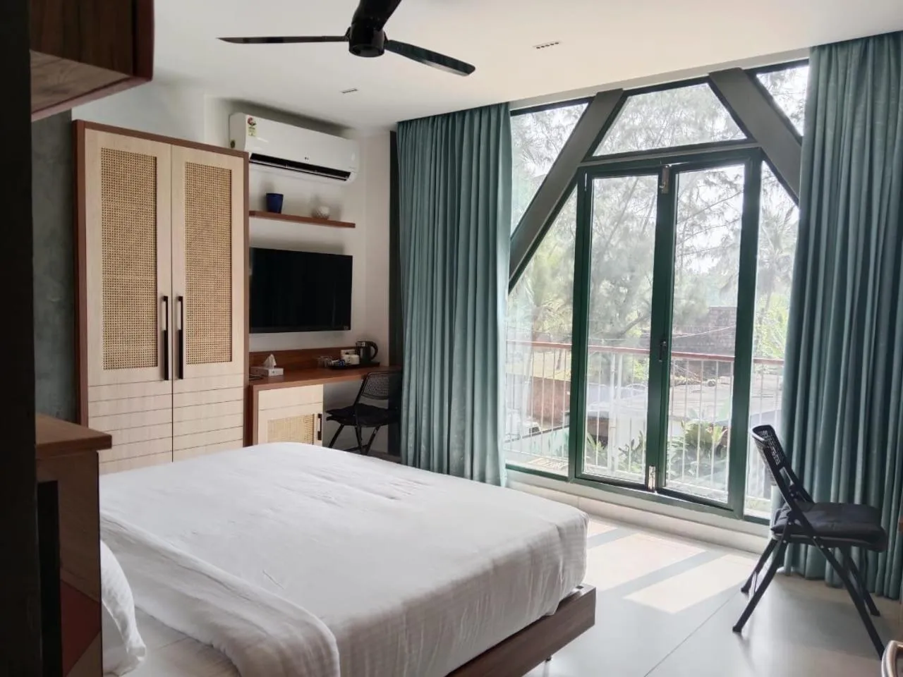 Bed in ANANSA BOUTIQUE HOTEL by The Kannur Club