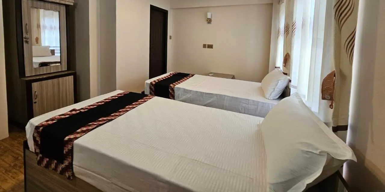 Bed in Hotel Durbar Side