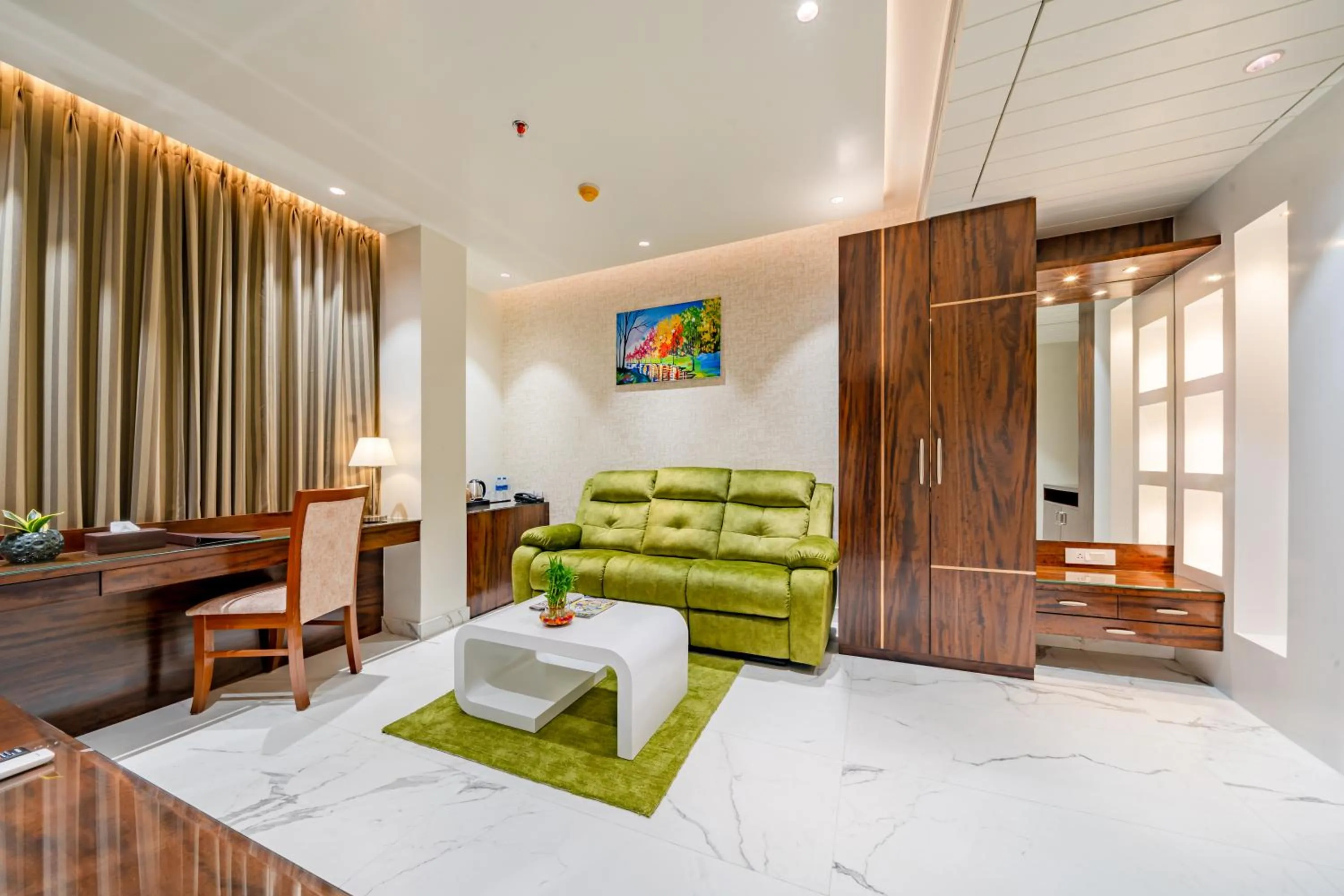 Living room, Bed in Payel Inn