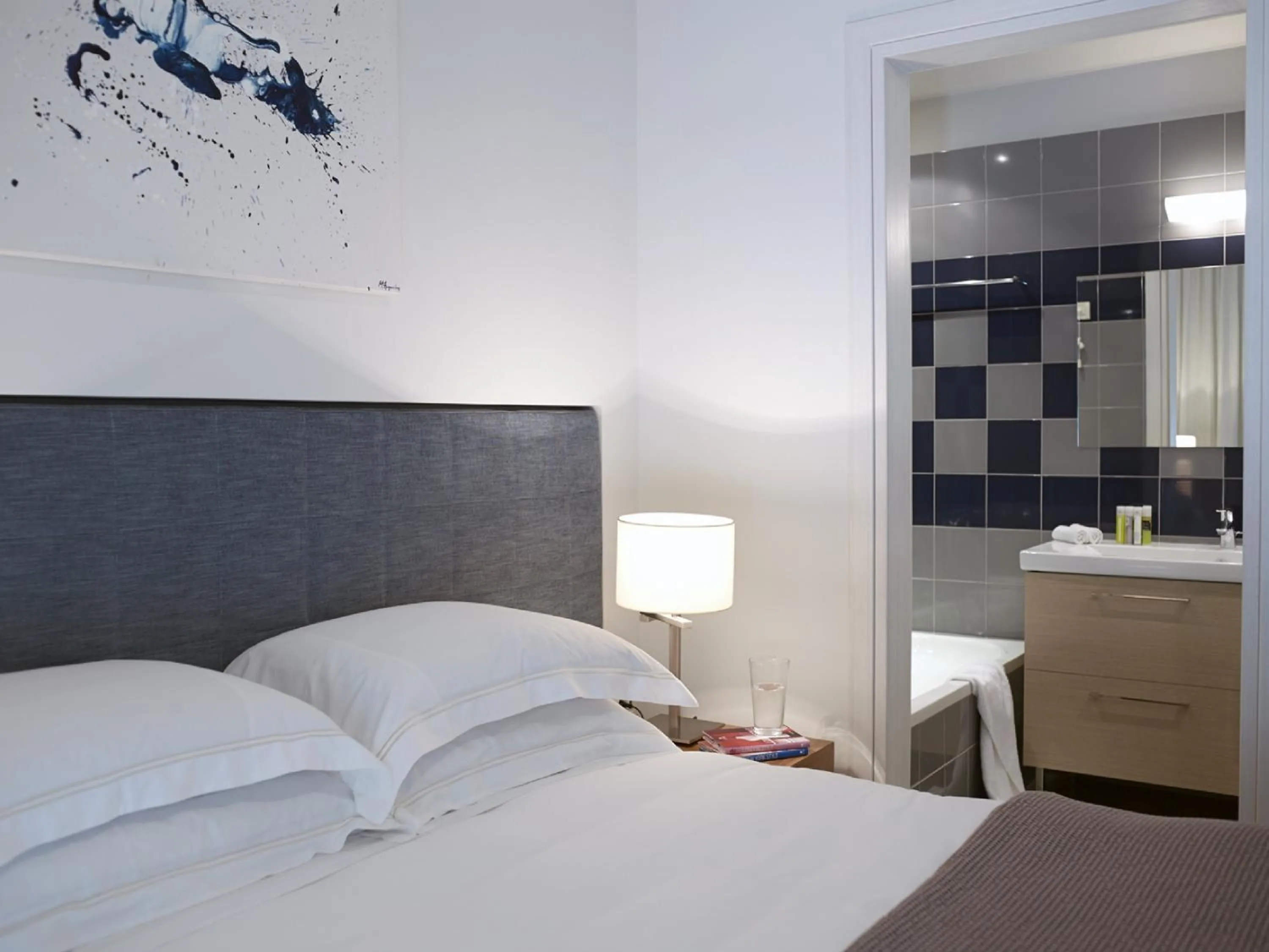 Toilet, Bed in Scale Suites