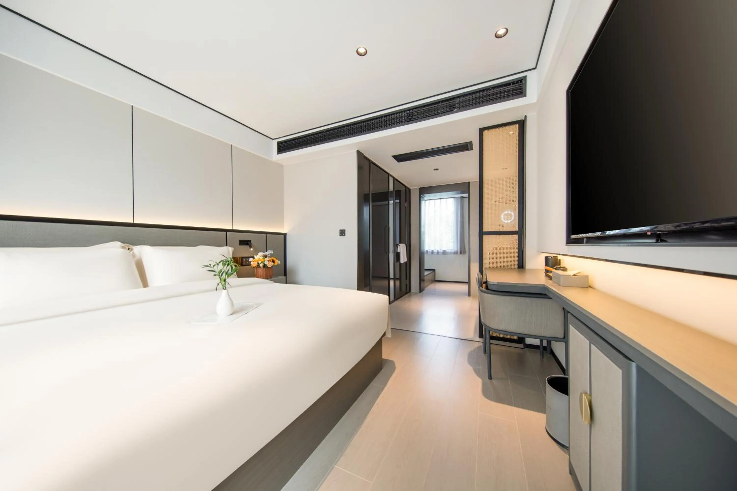 Bed in Gongxili - Xige Hotel Free Welcome Tea and Dessert