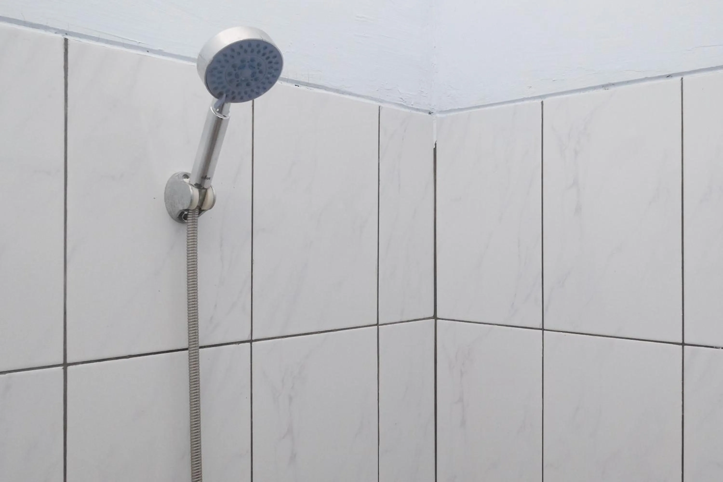 Bathroom in Urbanview Hotel LTefa Pemalang