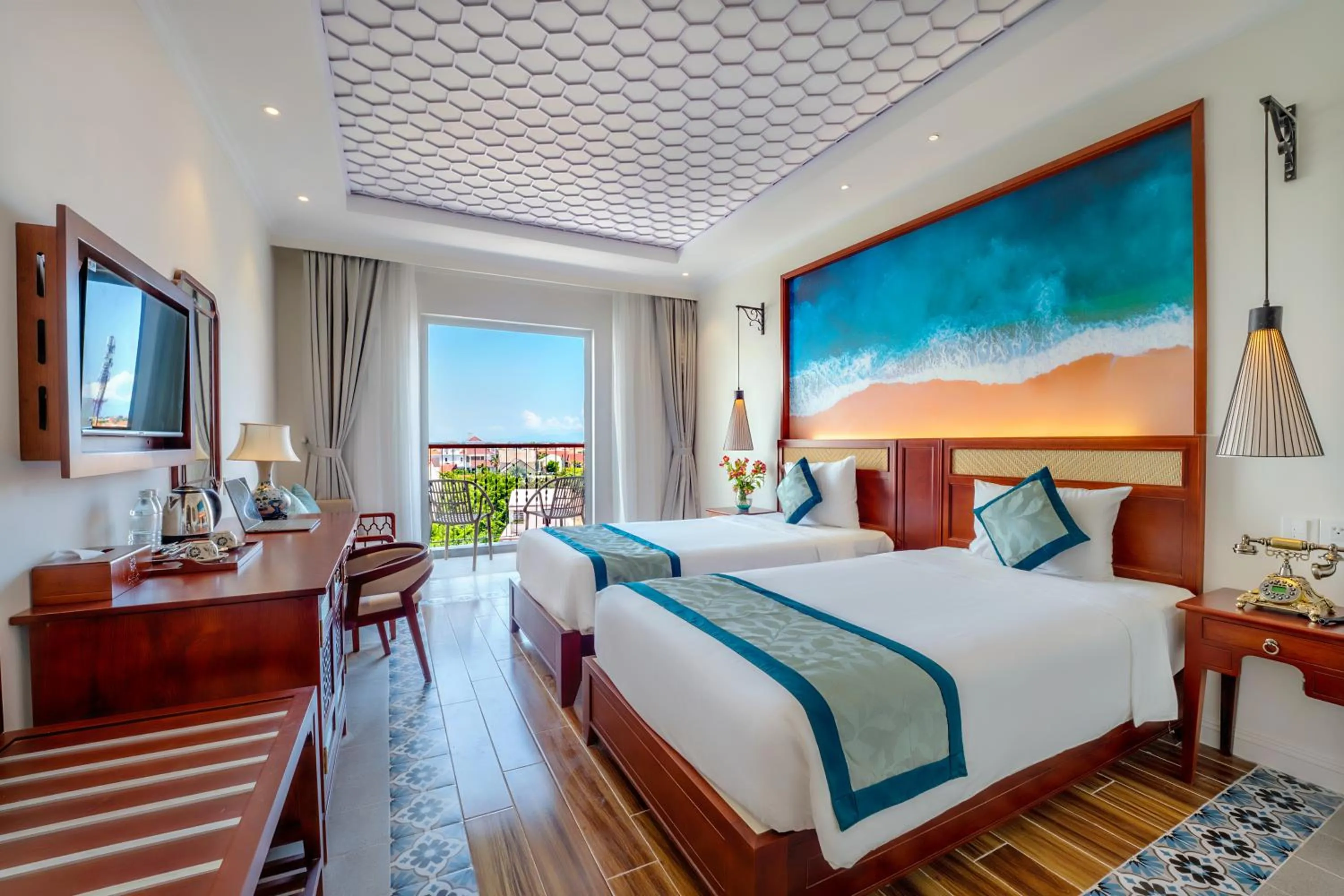 Communal lounge/ TV room, Bed in Amina Lantana Hoi An Hotel & Spa