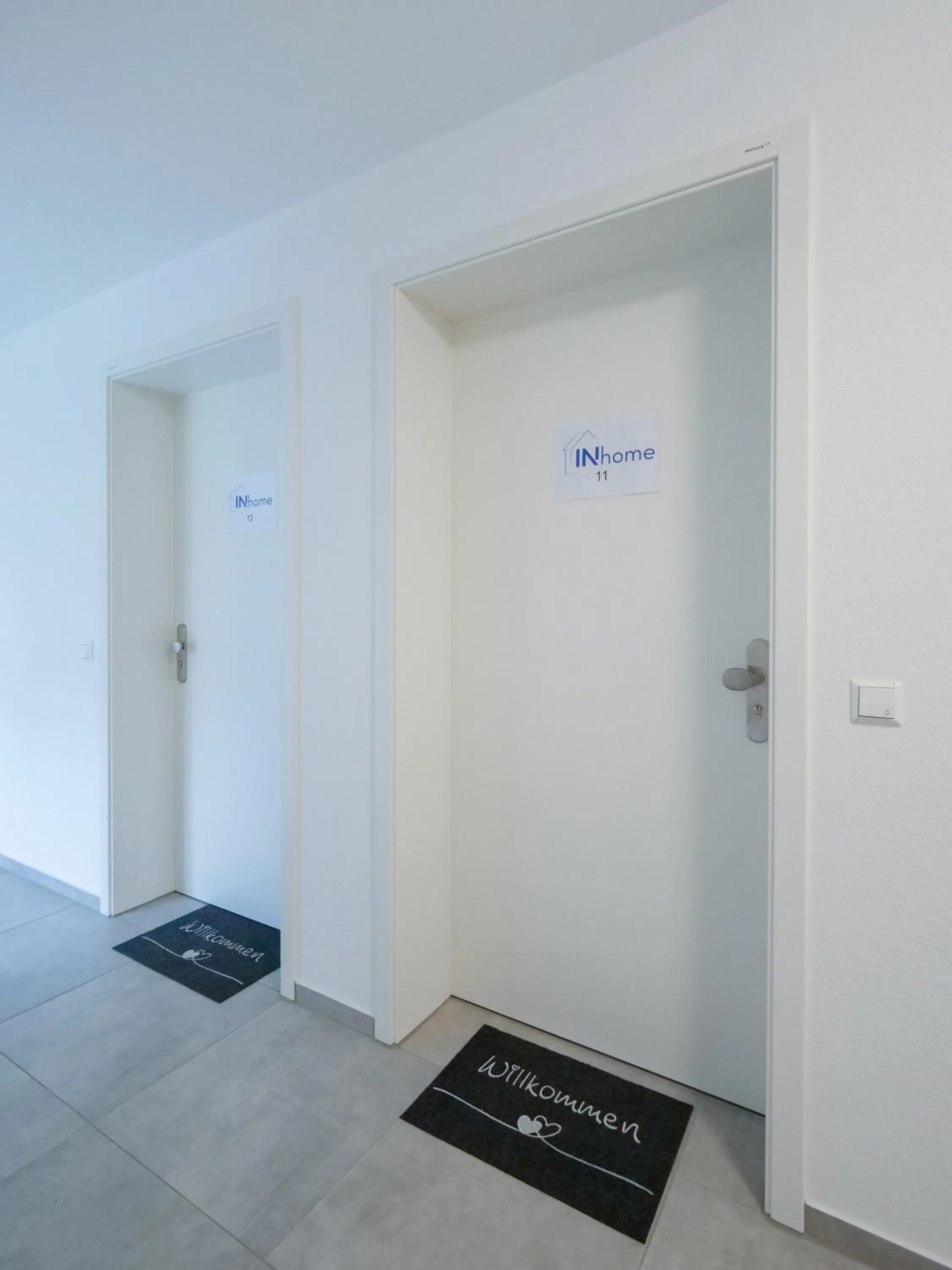 Facade/entrance in INhome Studio Apartment - Küche - Parken - TV