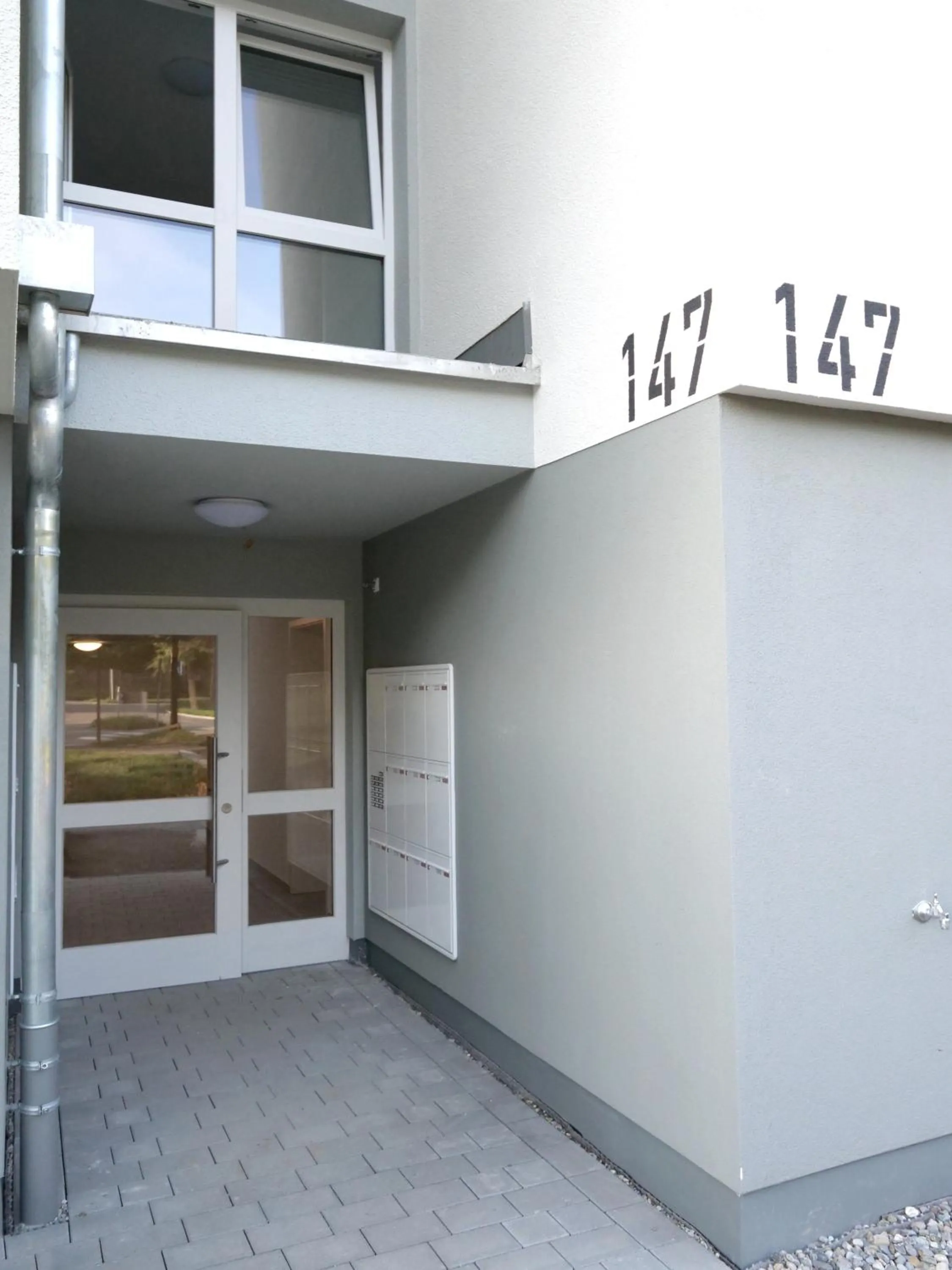 Property building in INhome Studio Apartment - Küche - Parken - TV