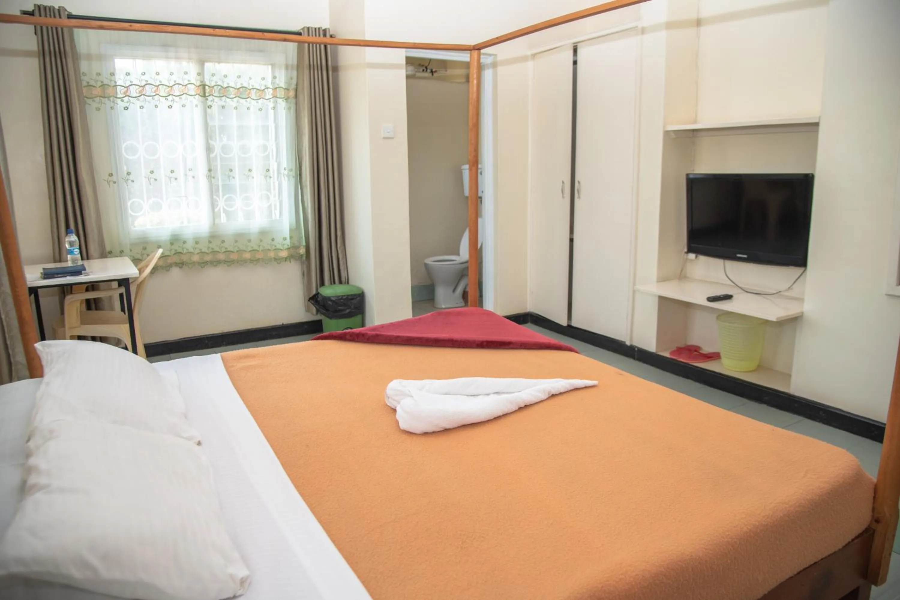 TV and multimedia, Bed in Acacia Resort Wote-Makueni by Nest & Nomad