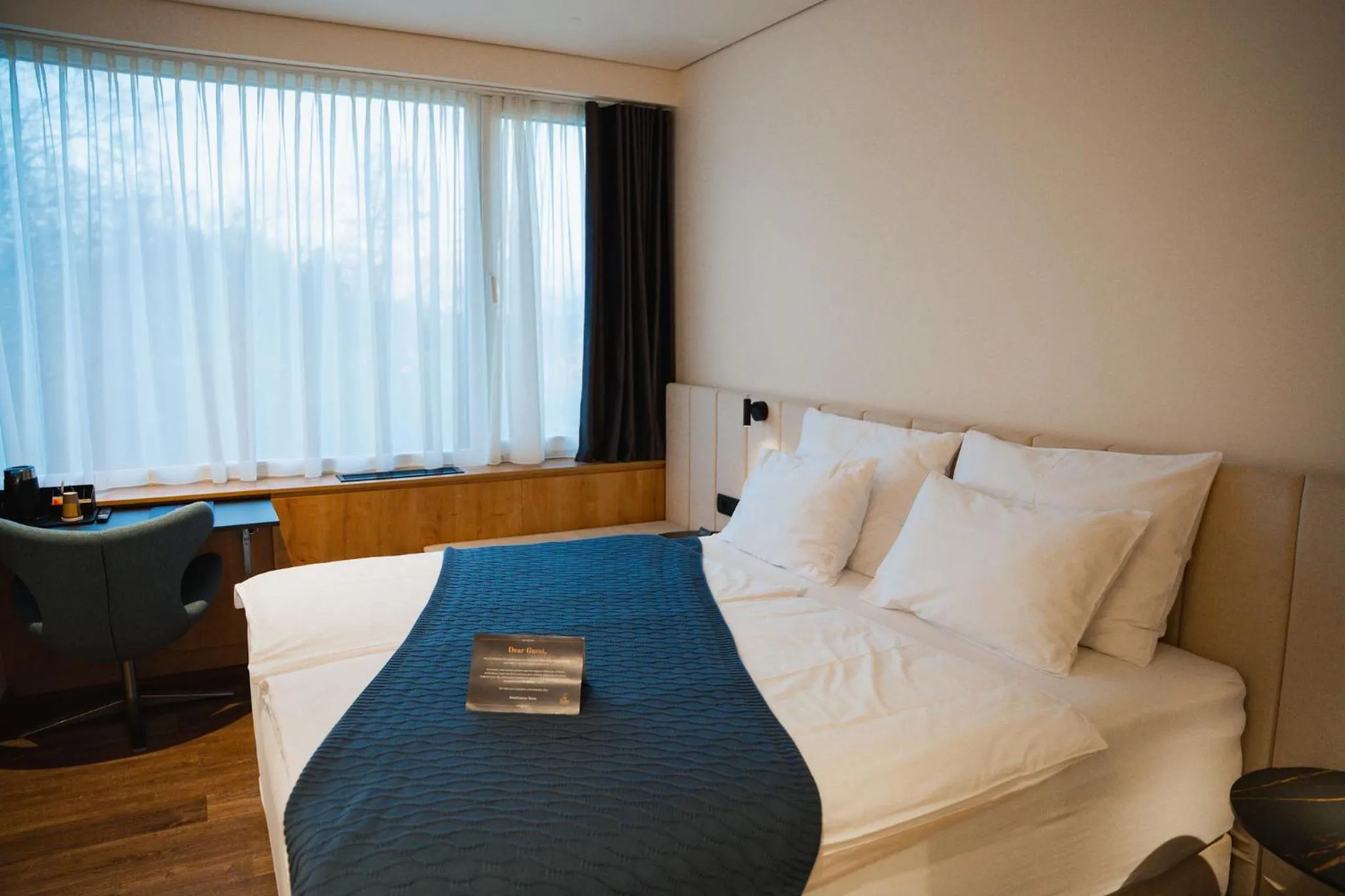 Seating area, Bed in Hotel Lonca