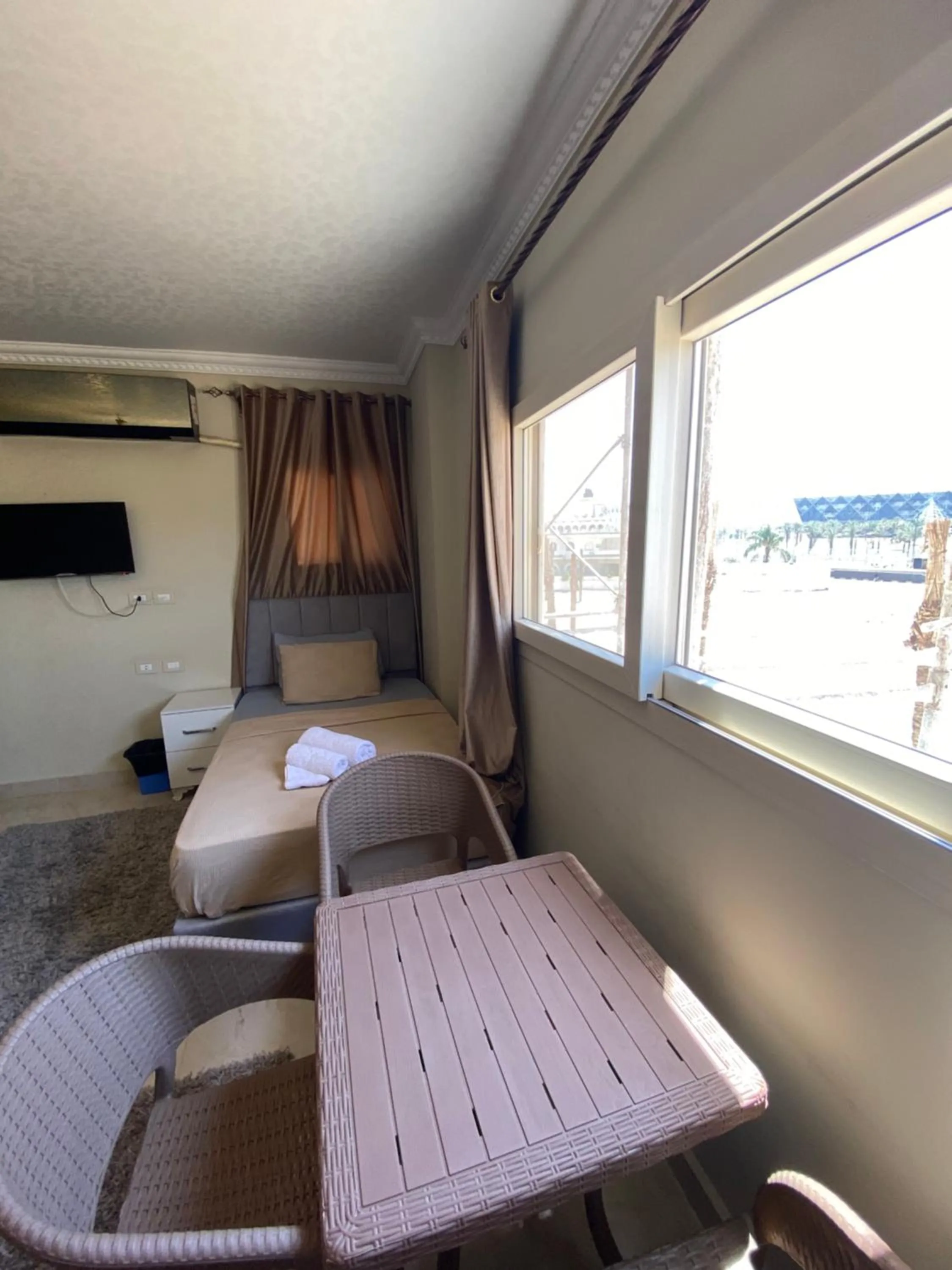 Seating area, Bed in GEM view BOUTIQUE