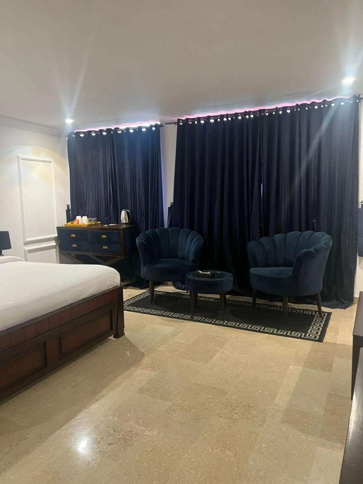 Seating area, Bed in BULAND HEIGHTS