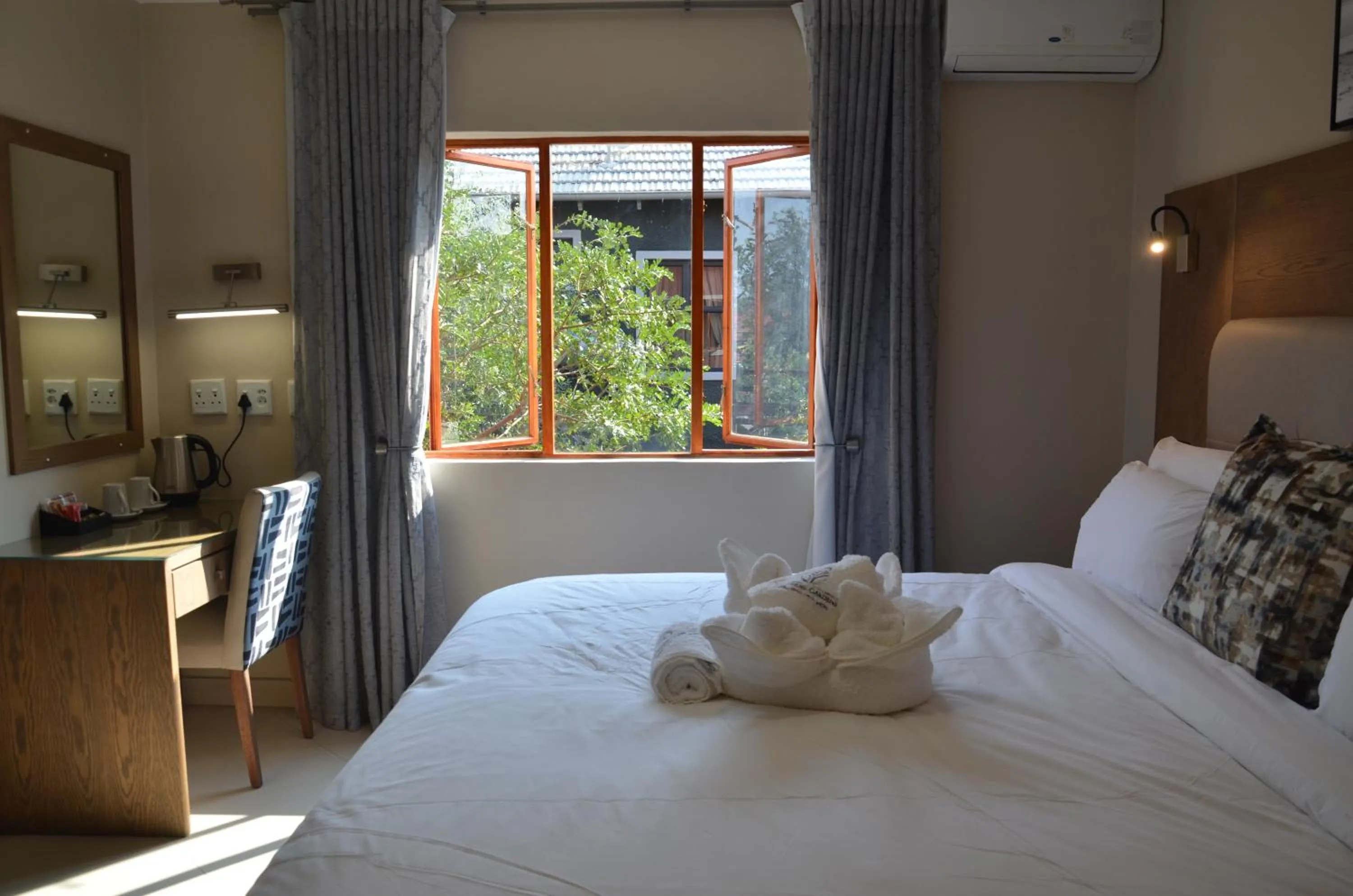 Bed in Windhoek Gardens Boutique Hotel