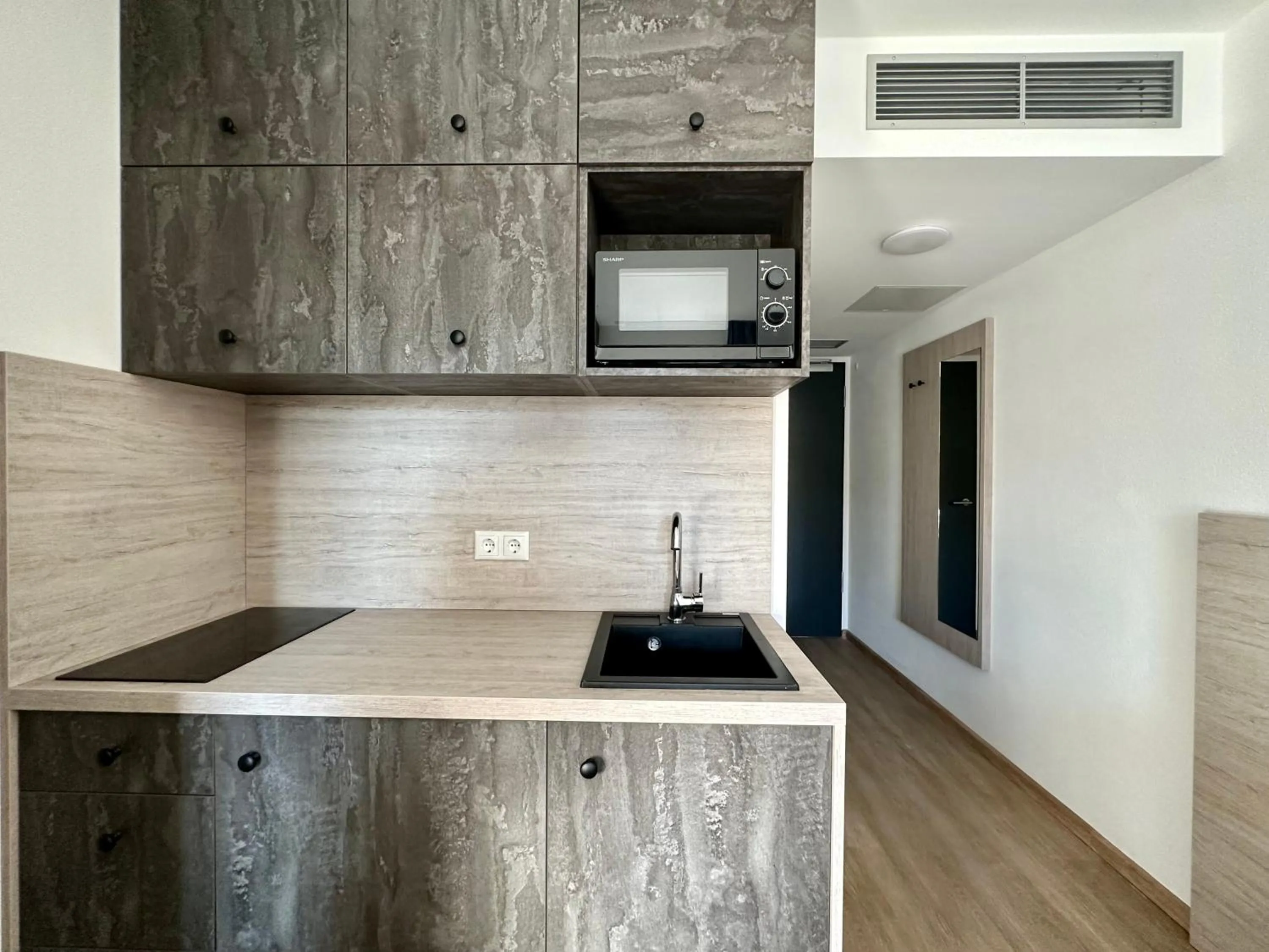 Kitchen or kitchenette in Apartimo München-Unterhaching