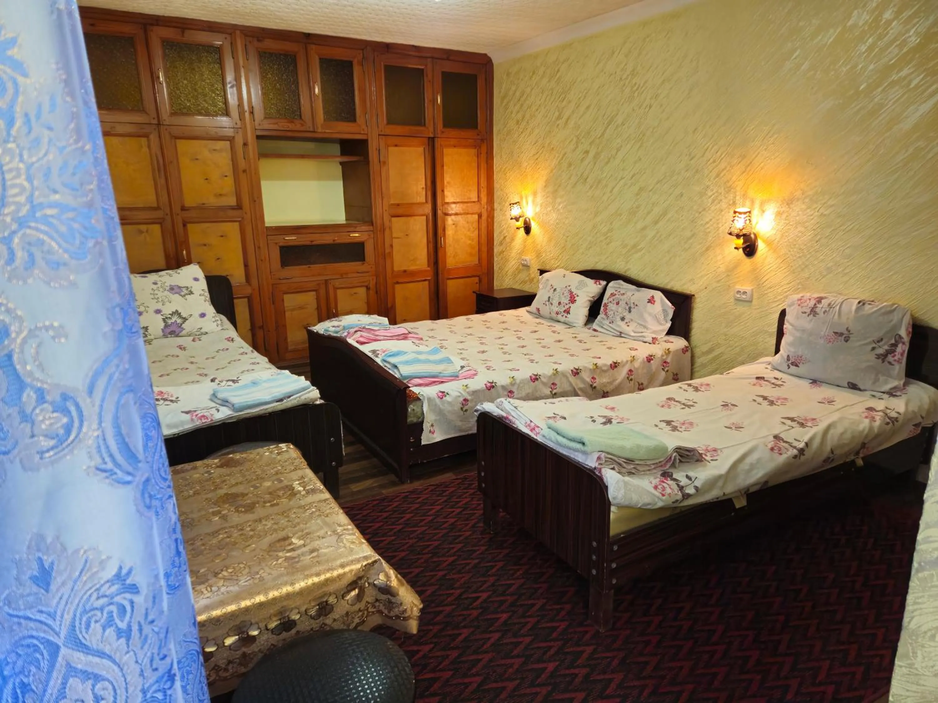 Bed in B&B Bahodir