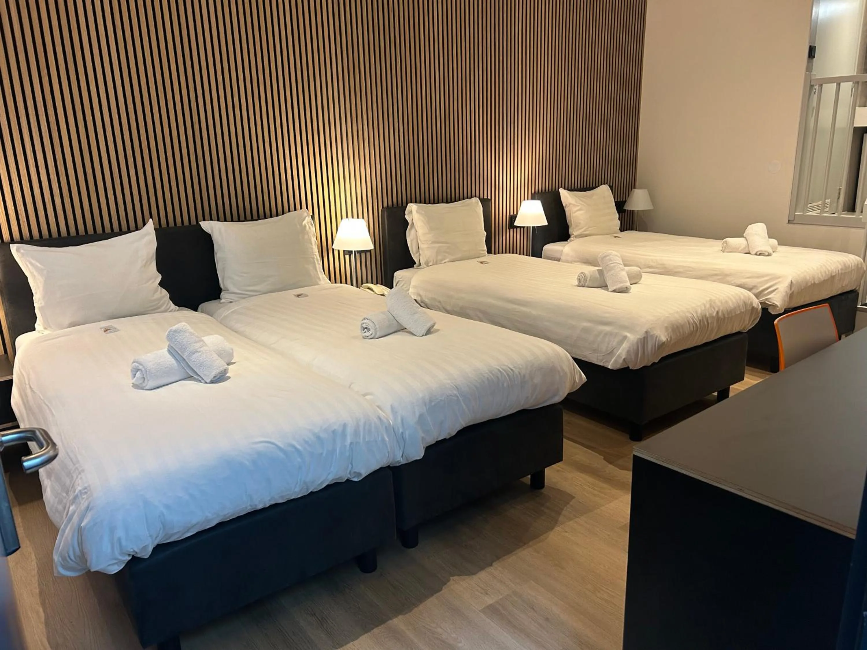 Bed in Multatuli Hotel