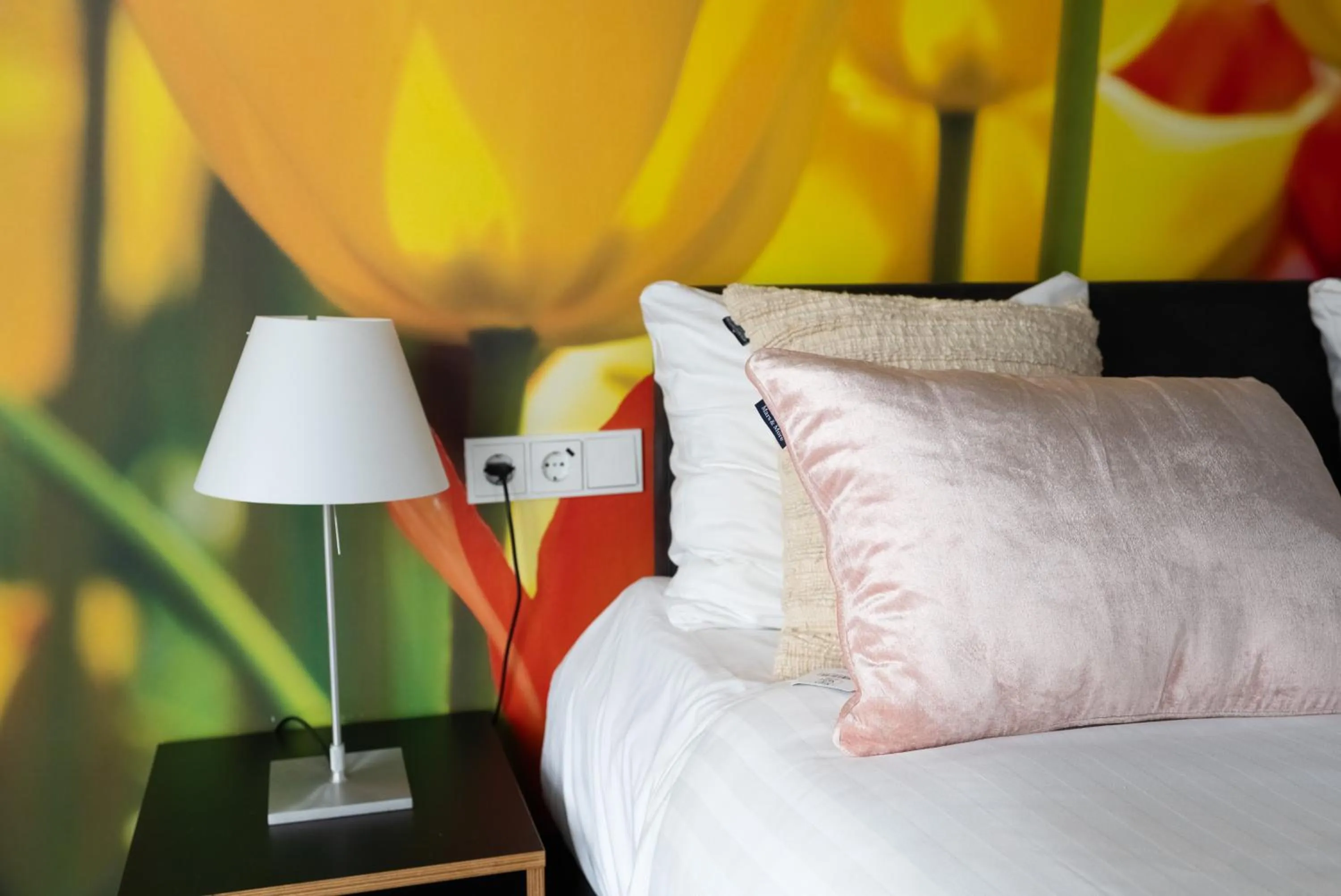 Bed in Multatuli Hotel