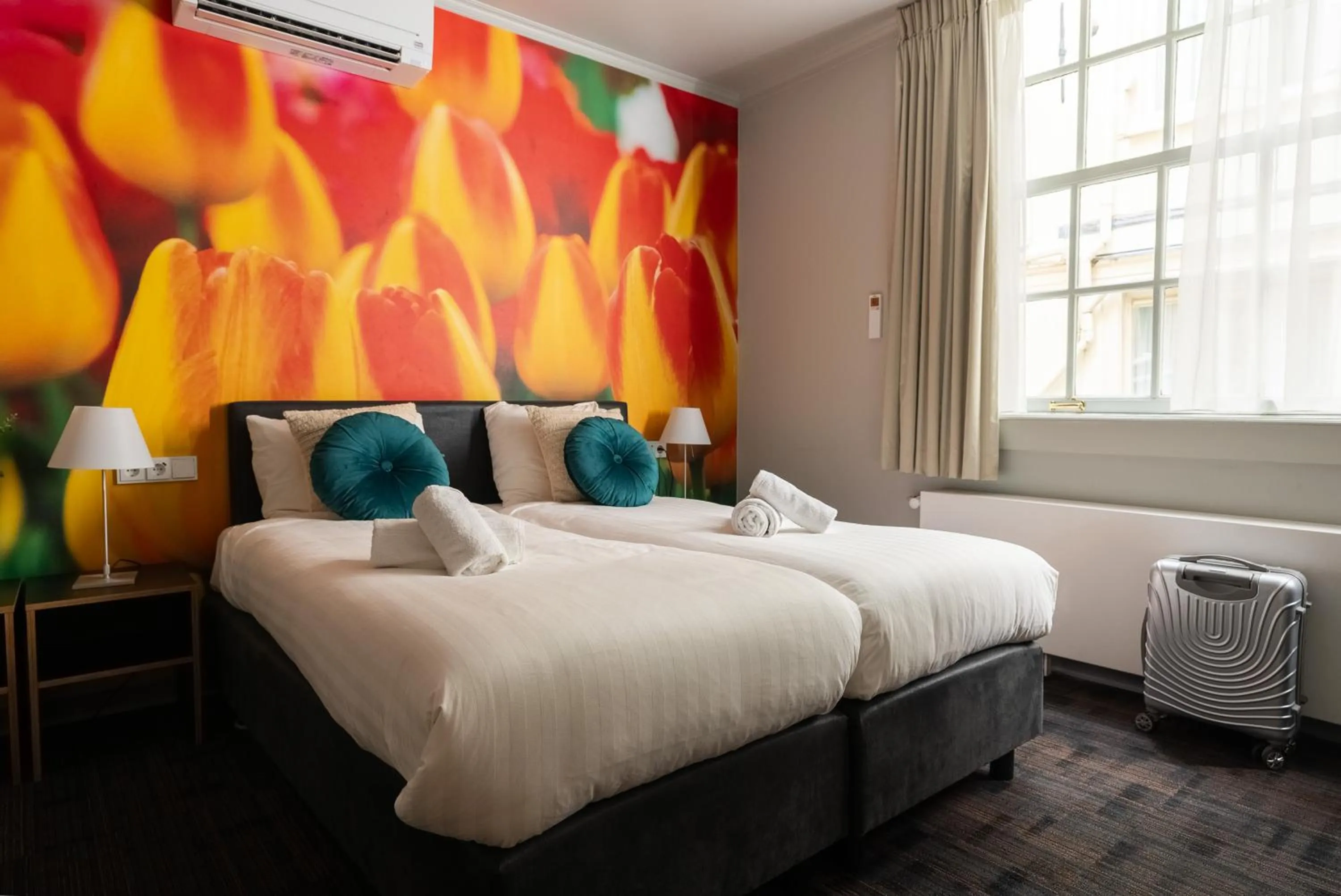 Bed in Multatuli Hotel