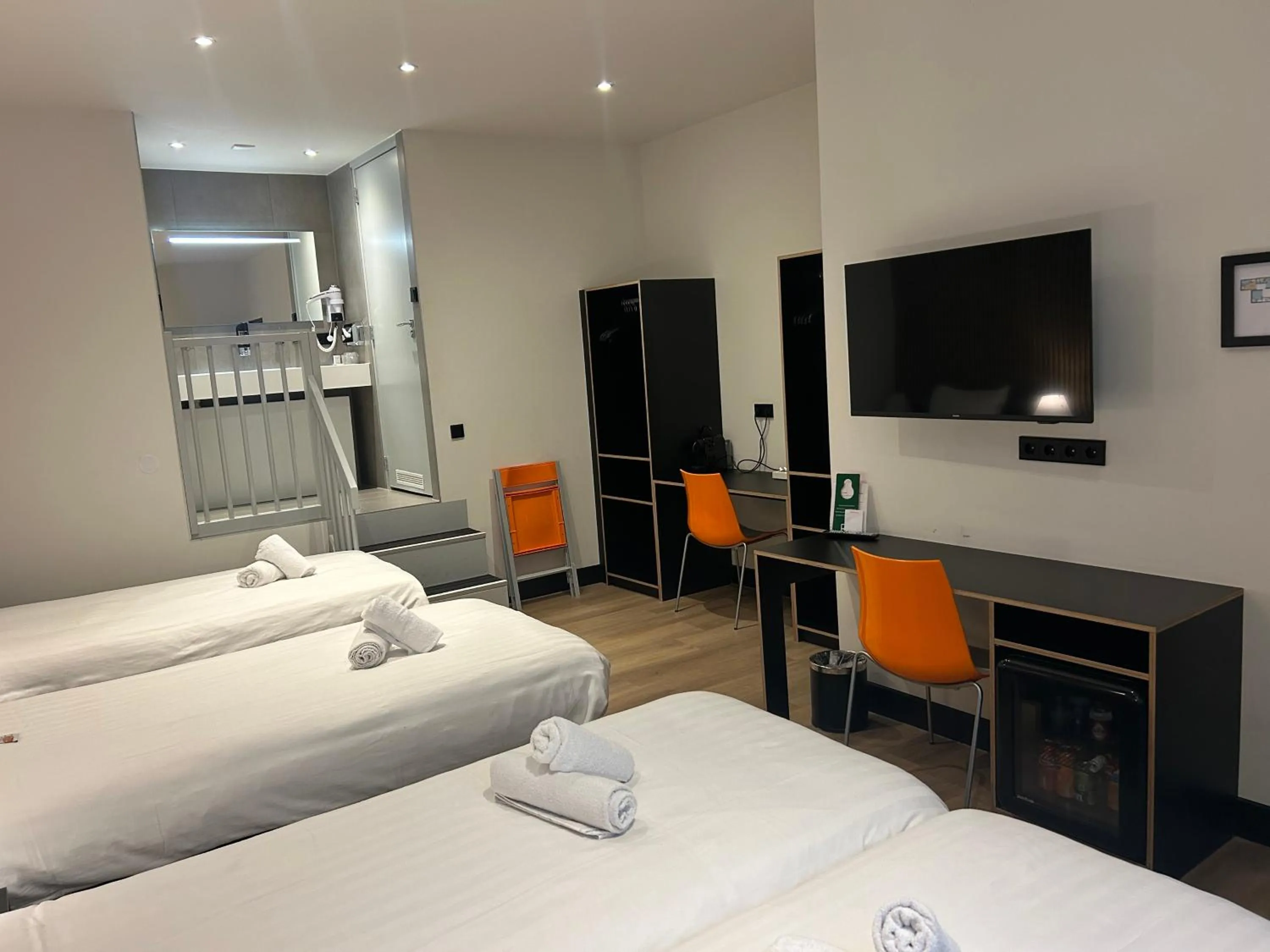 Bed in Multatuli Hotel