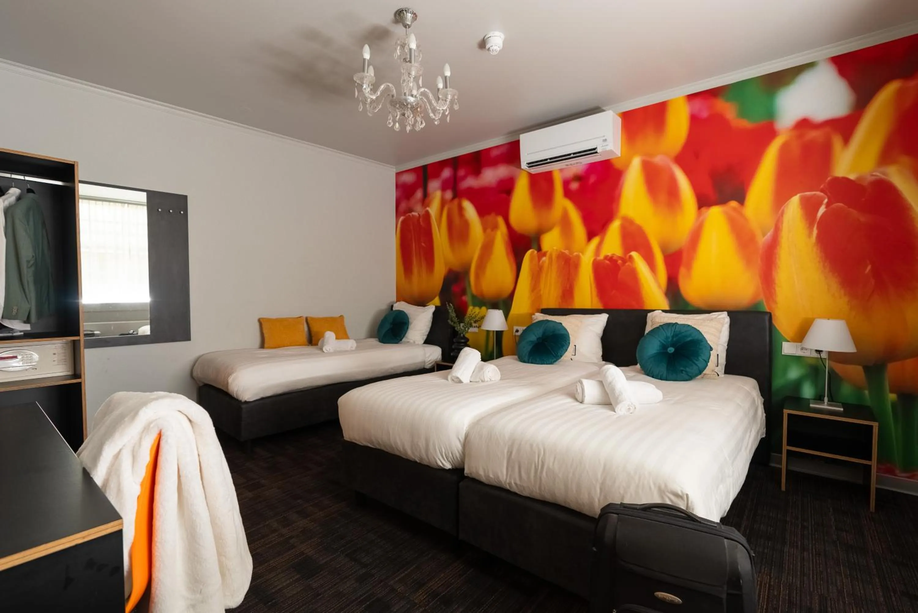 Bed in Multatuli Hotel