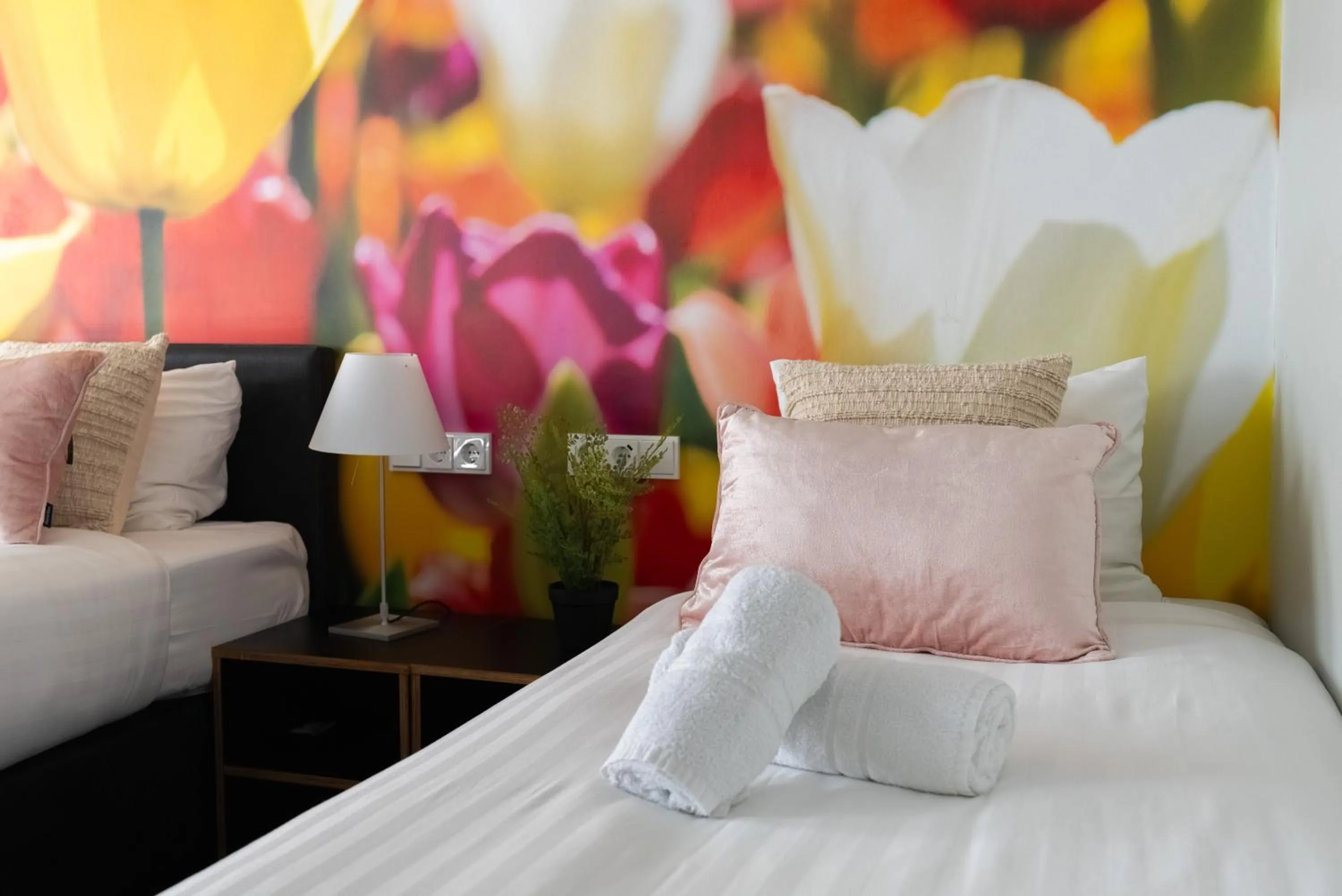 Bed in Multatuli Hotel