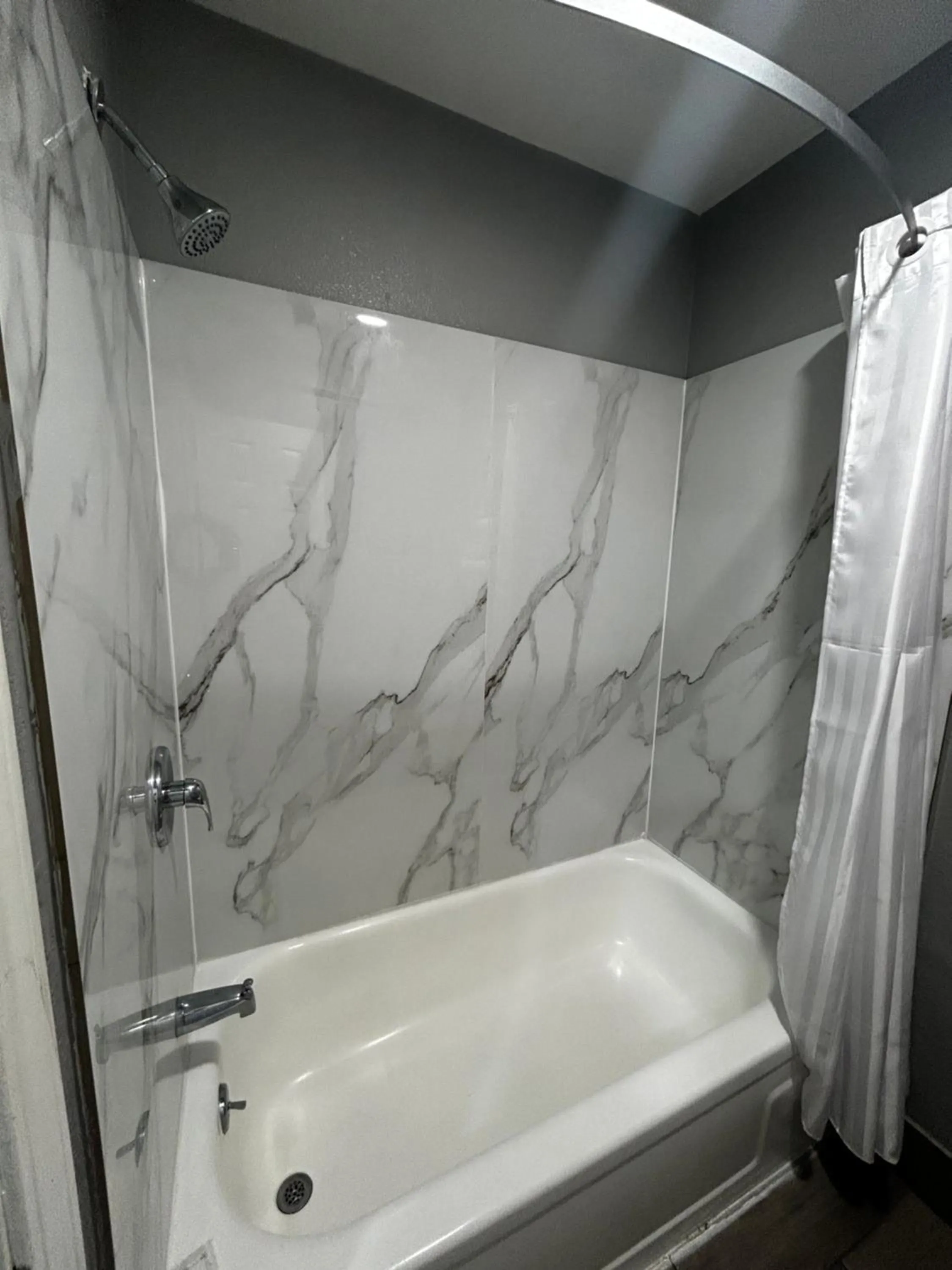 Bathroom in Coachman's Inn & Suites