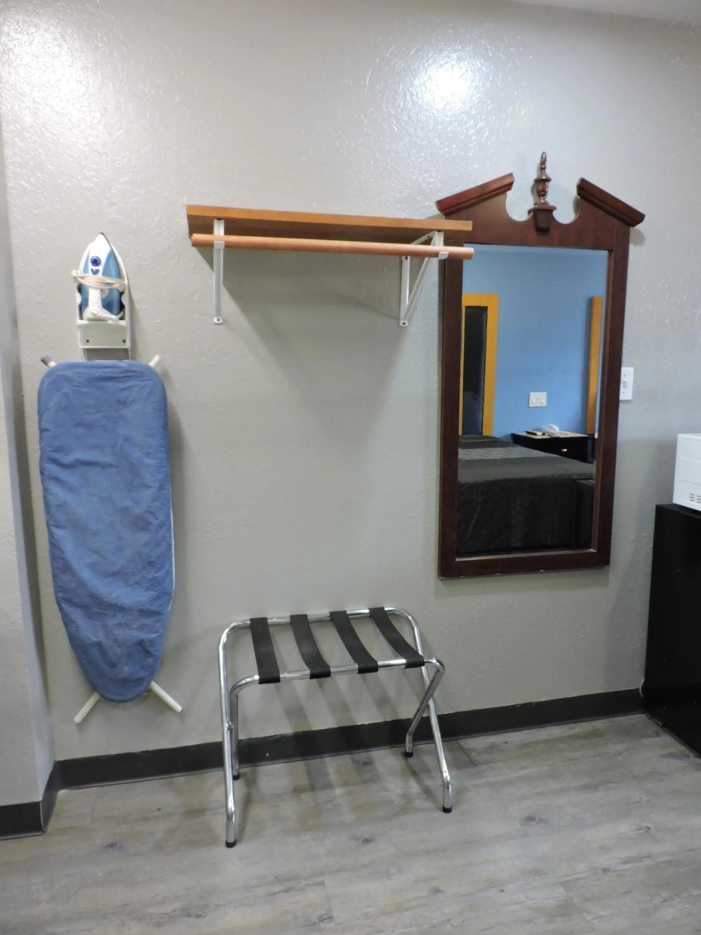 Bedroom in Coachman's Inn & Suites