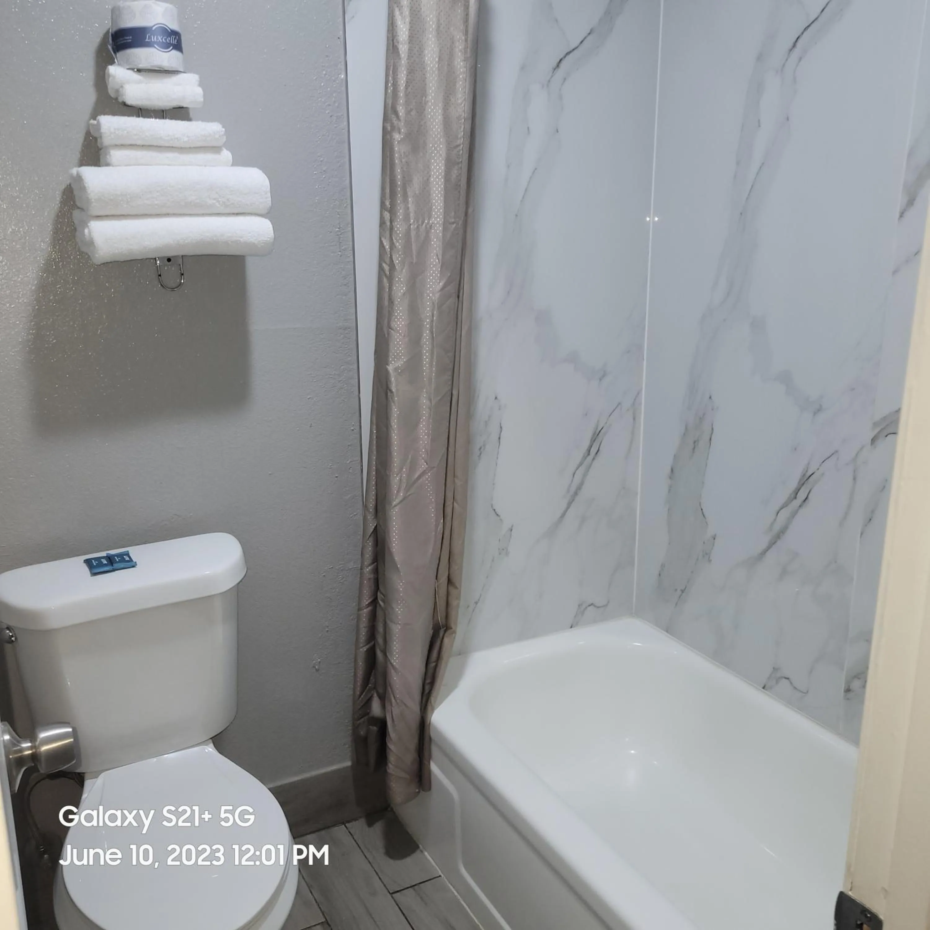 Toilet in Coachman's Inn & Suites