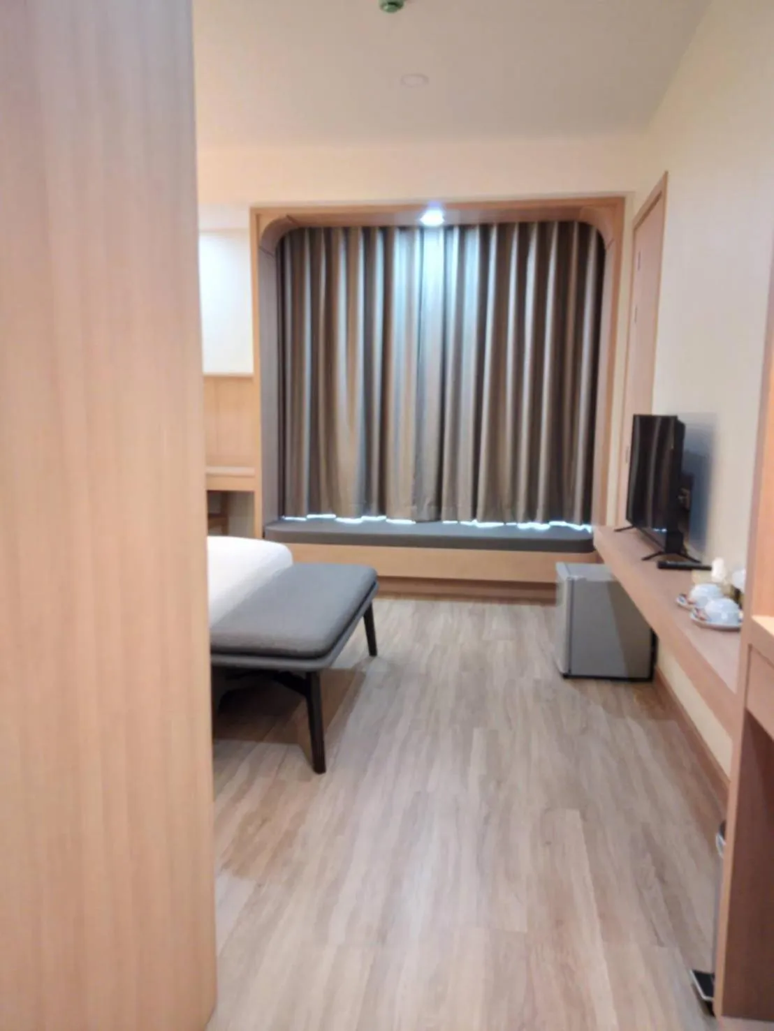 Photo of the whole room, Bed in Mayflower Grande Suite Hotel