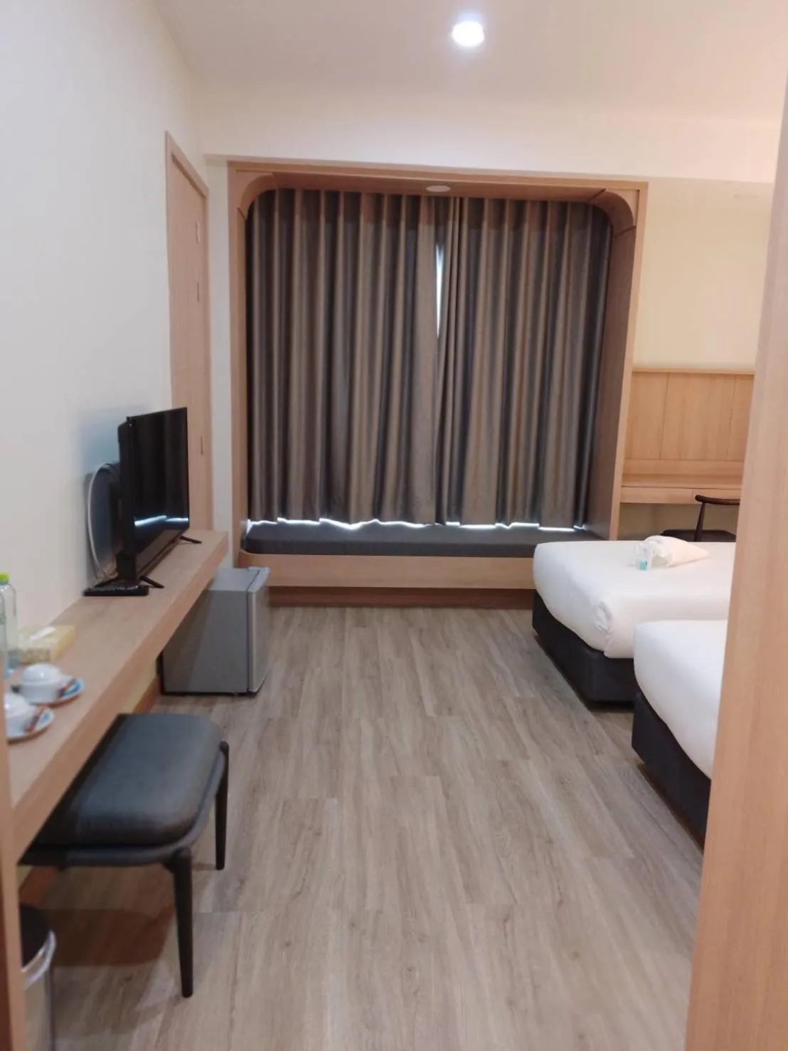 Bed in Mayflower Grande Suite Hotel