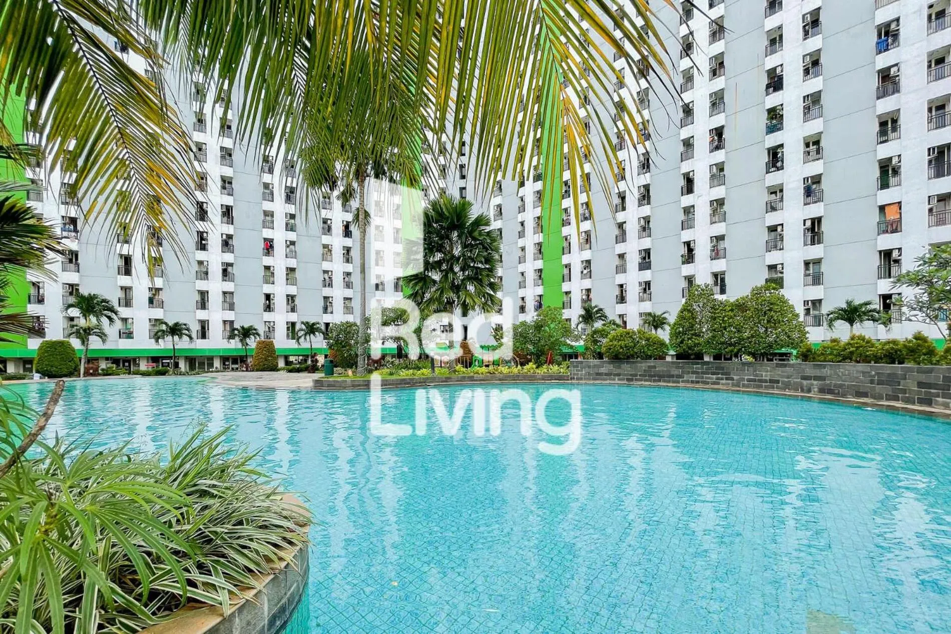Swimming pool in RedLiving Apartemen Green Lake View Ciputat - Aurora Rooms