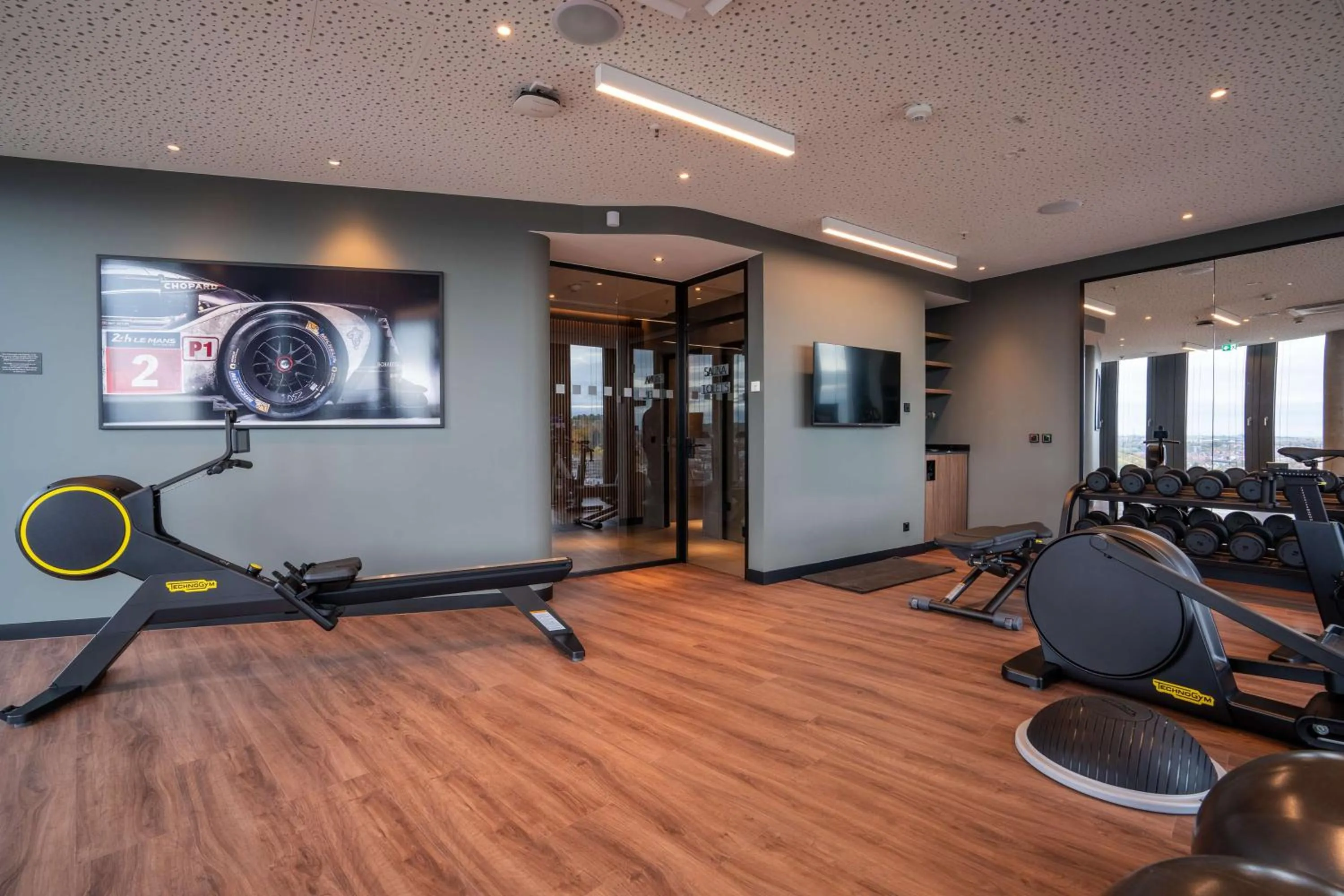 Fitness centre/facilities in Radisson Blu Hotel at Porsche Design Tower Stuttgart