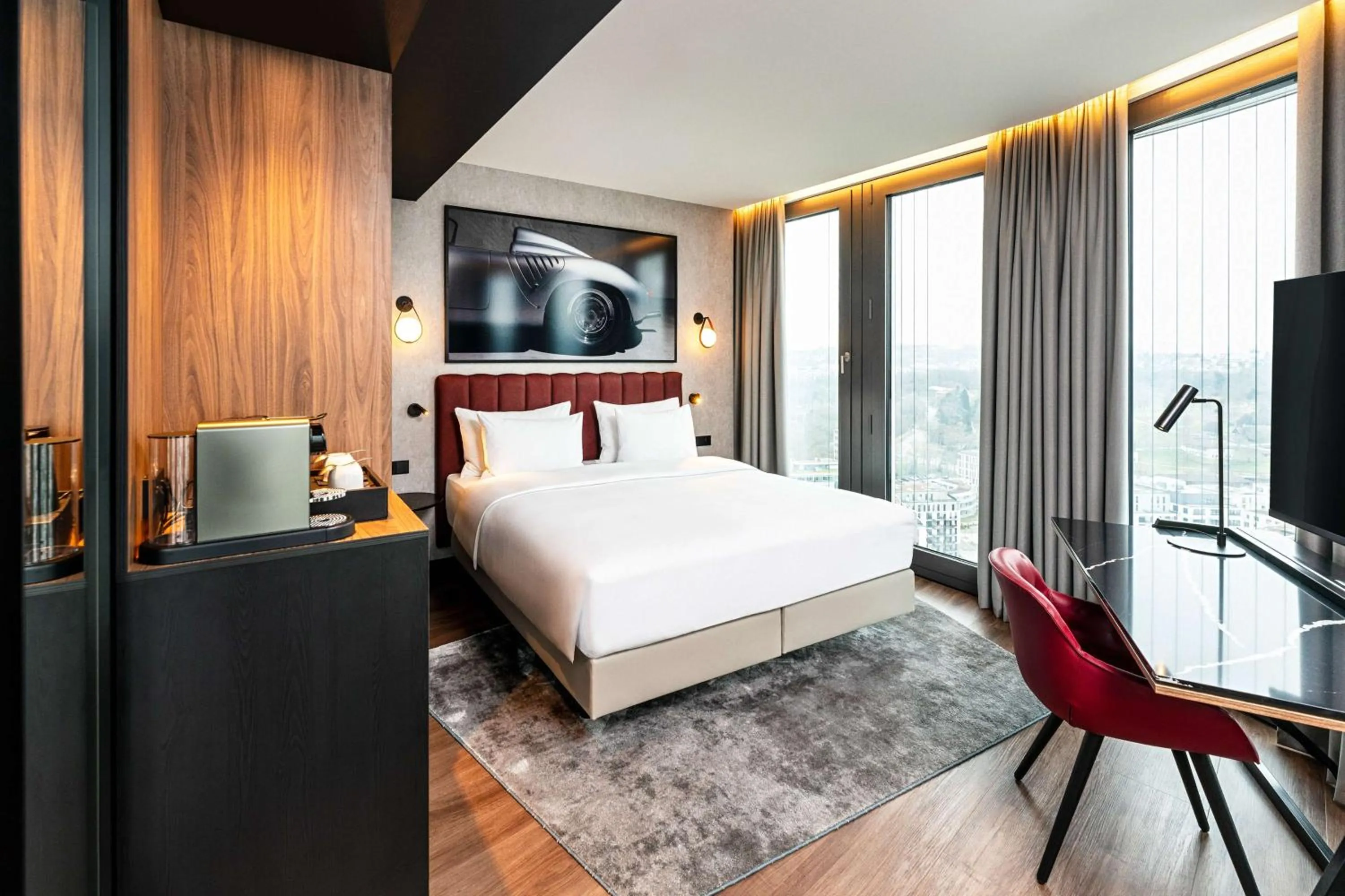 Bedroom, Bed in Radisson Blu Hotel at Porsche Design Tower Stuttgart