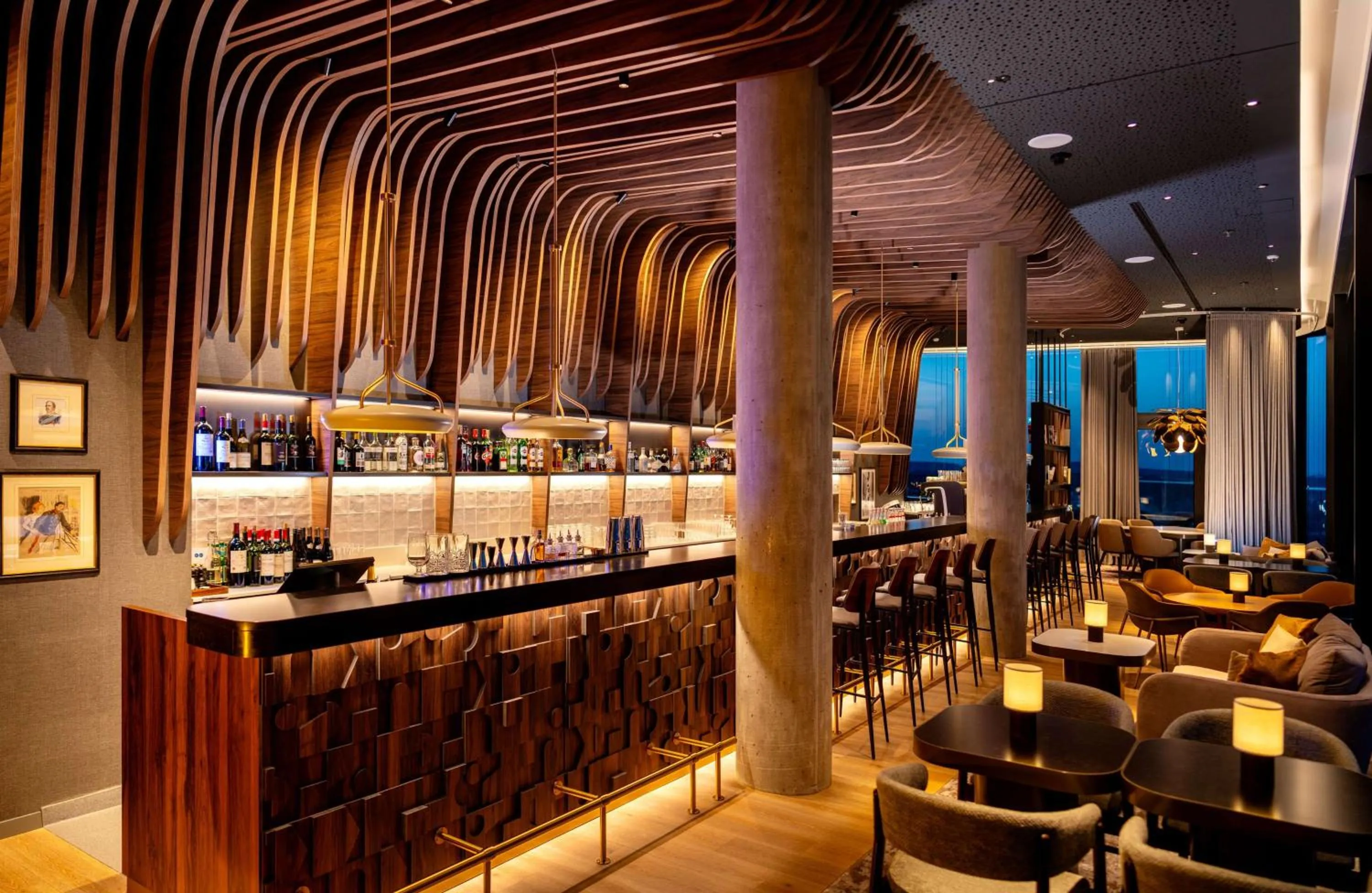 Lounge or bar in Radisson Blu Hotel at Porsche Design Tower Stuttgart