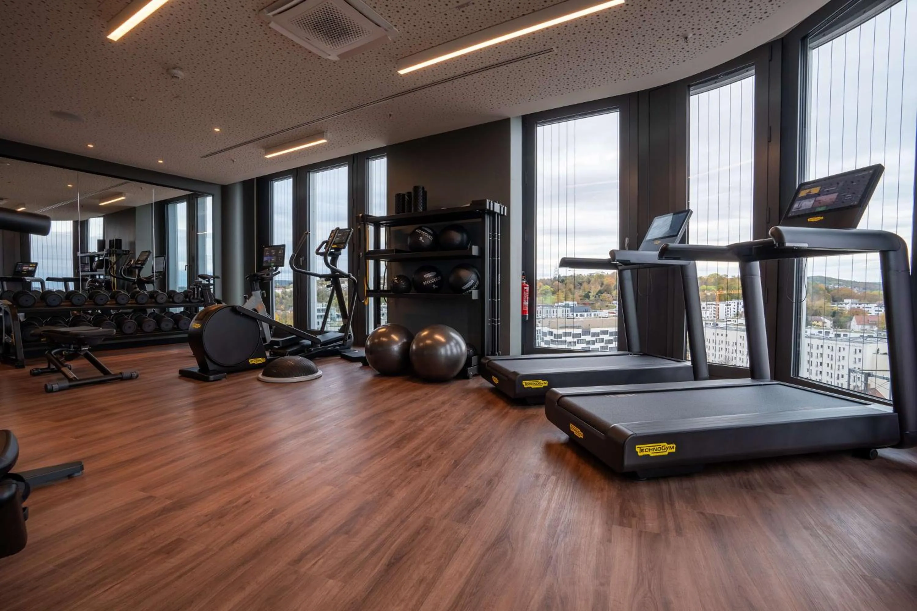 Fitness centre/facilities in Radisson Blu Hotel at Porsche Design Tower Stuttgart