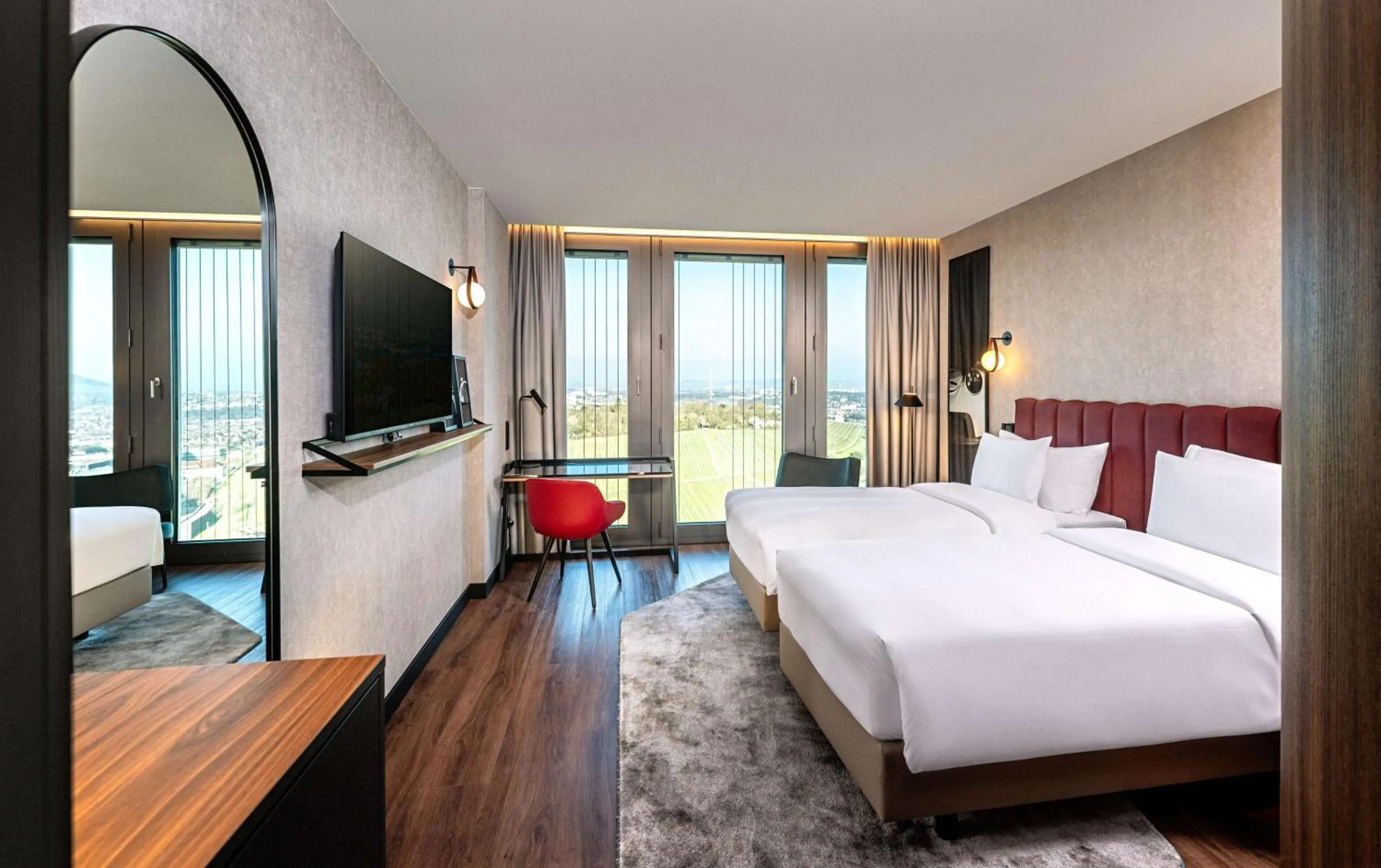 Bedroom, Bed in Radisson Blu Hotel at Porsche Design Tower Stuttgart