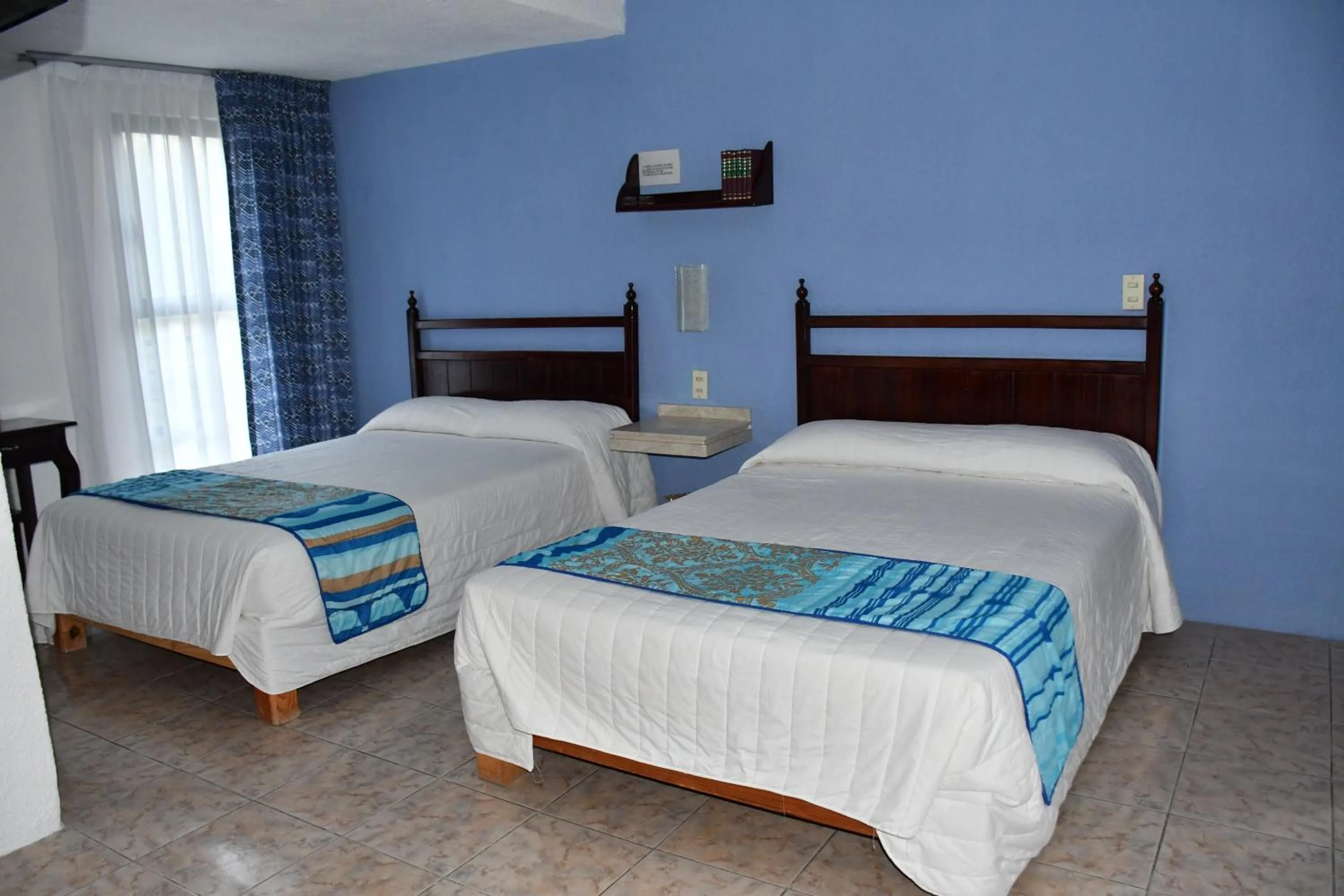 Bed in Hotel Posada Santa Fe