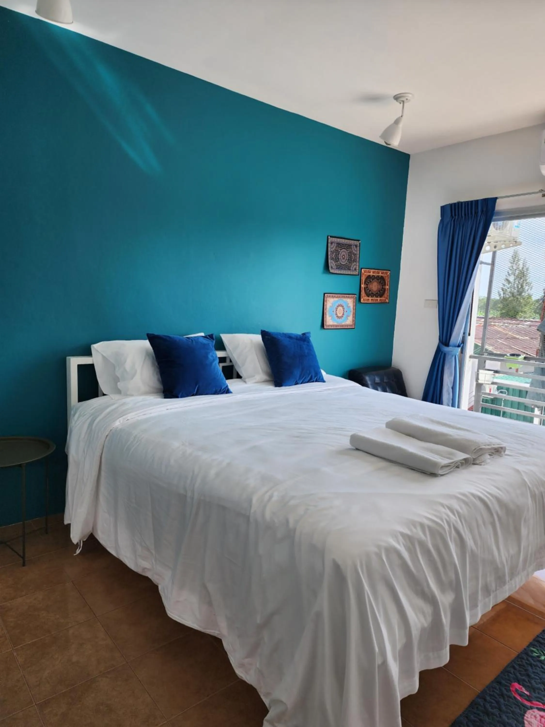 Bed in Pinpoint Hotel Phuket