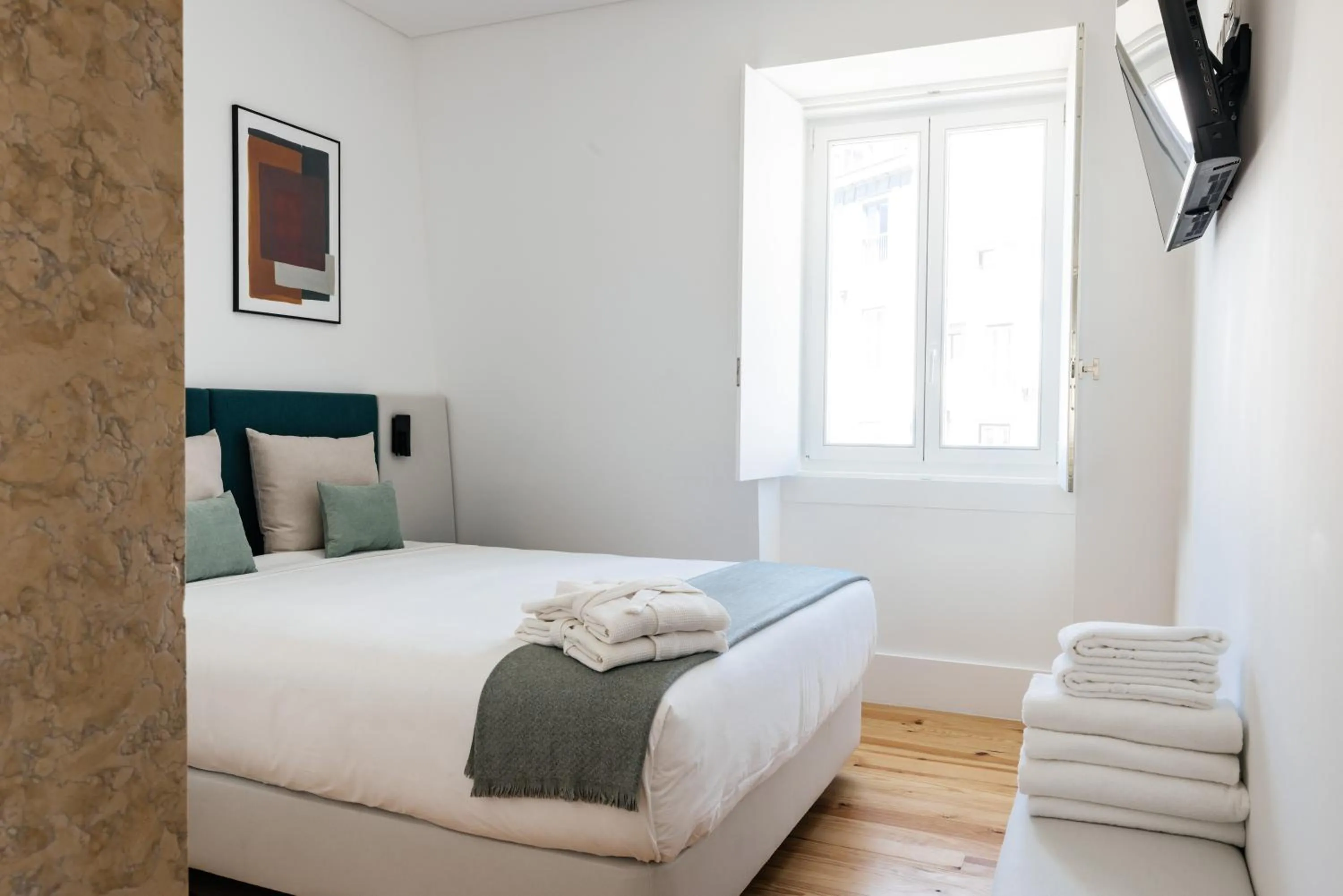 Bed in The House on the Pink Street in Lisbon