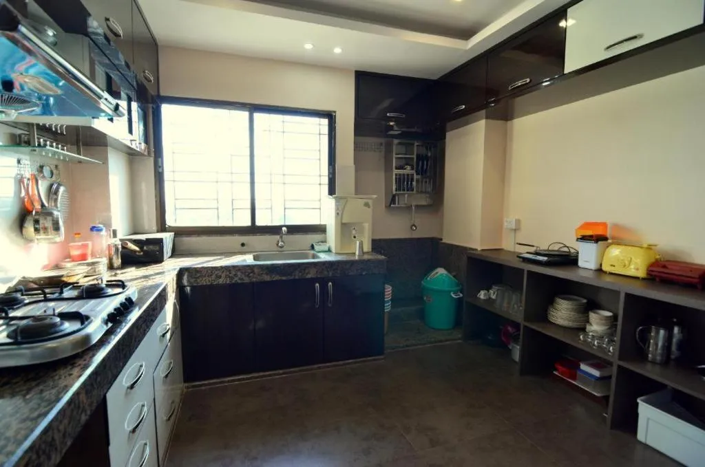 Kitchen or kitchenette in Tulip Residency